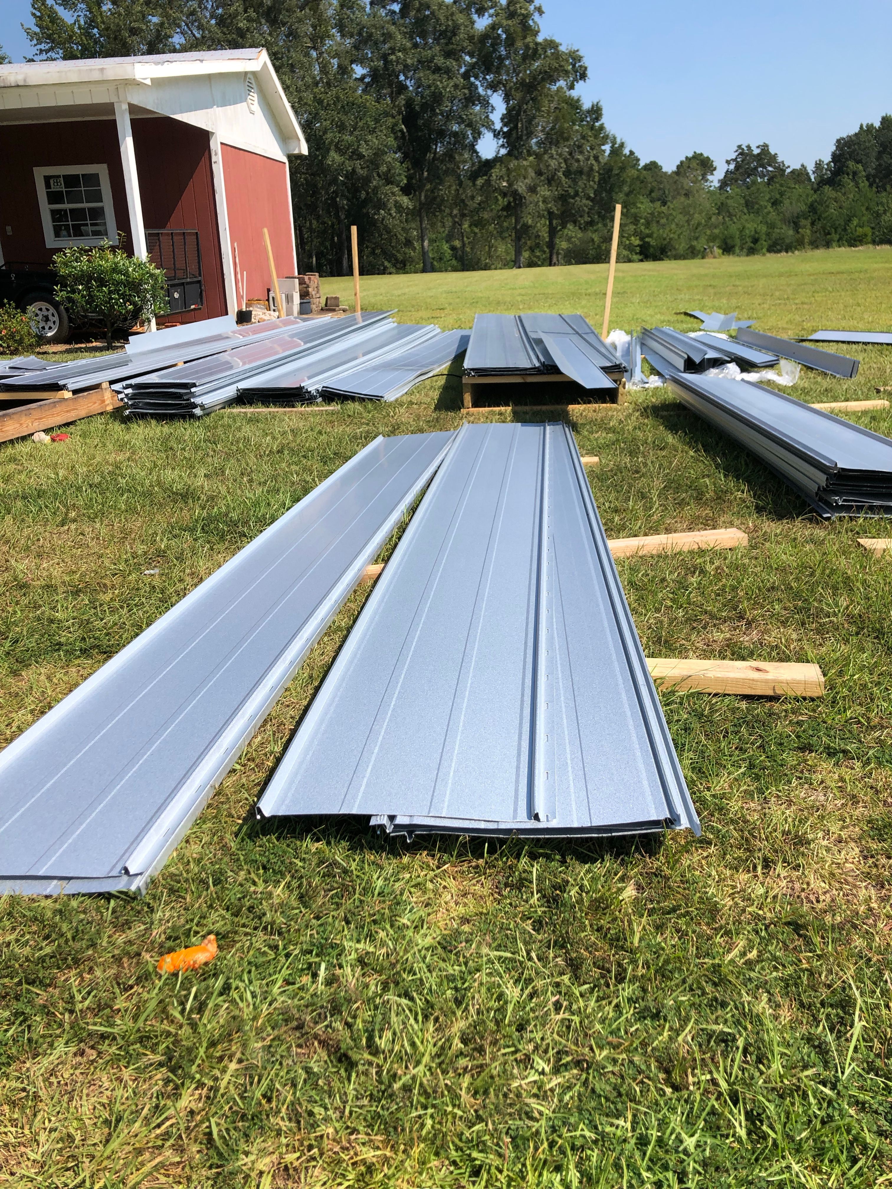 Residential Roofing Installation using Metal roofing by American Roofing & Construction LLC