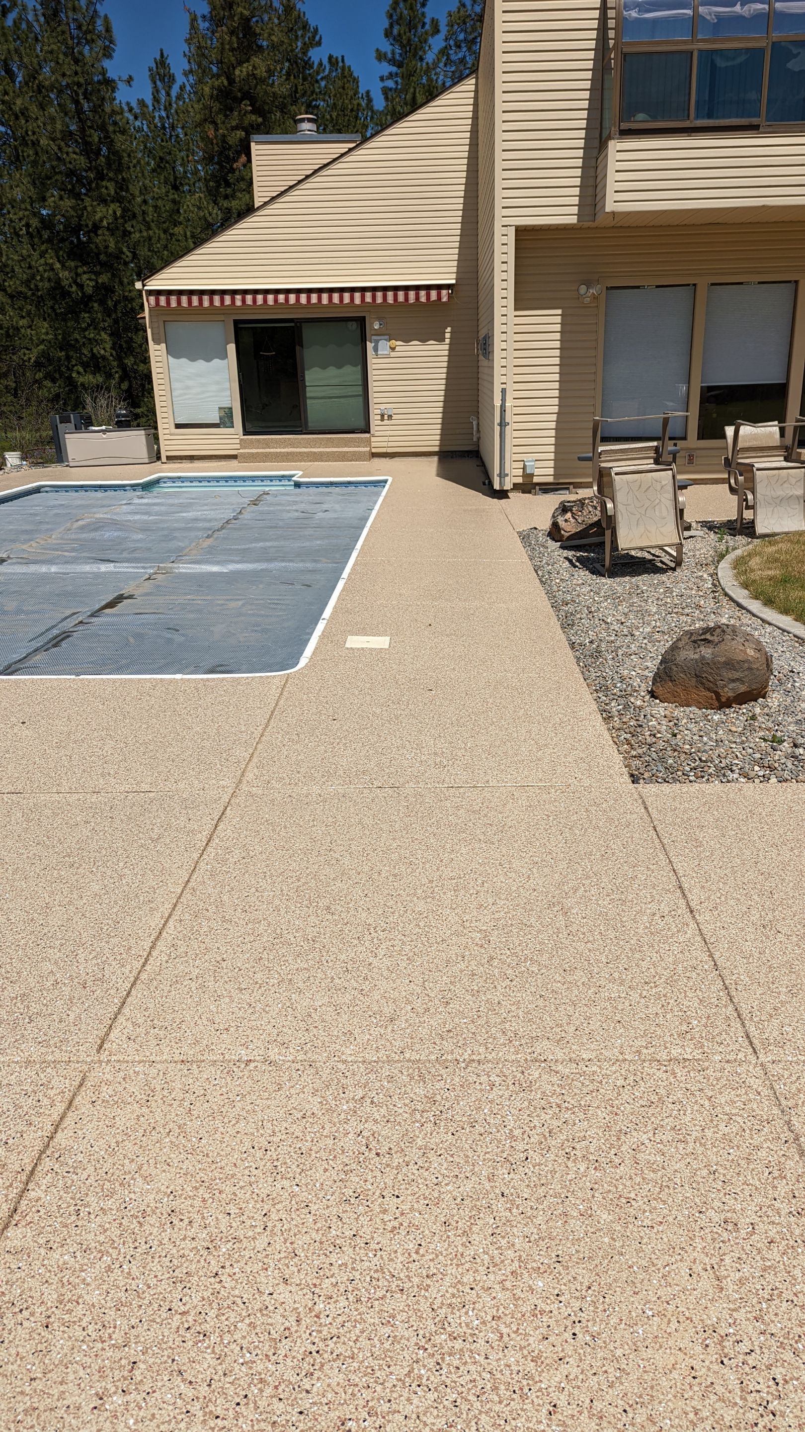 Garage Transformation using Domino for Garage and Pecan for Pool Deck by Croc Coatings, LLC