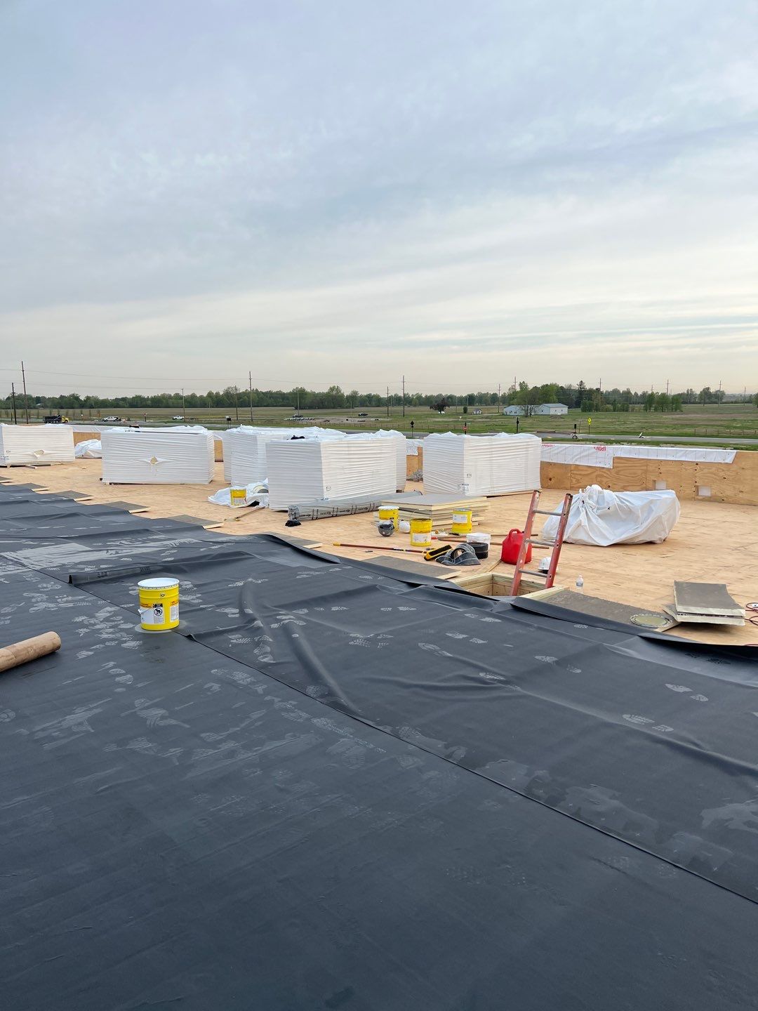 Commercial Roofing Installation using 60 mil rubber roof  by Nitro Roofing and Construction