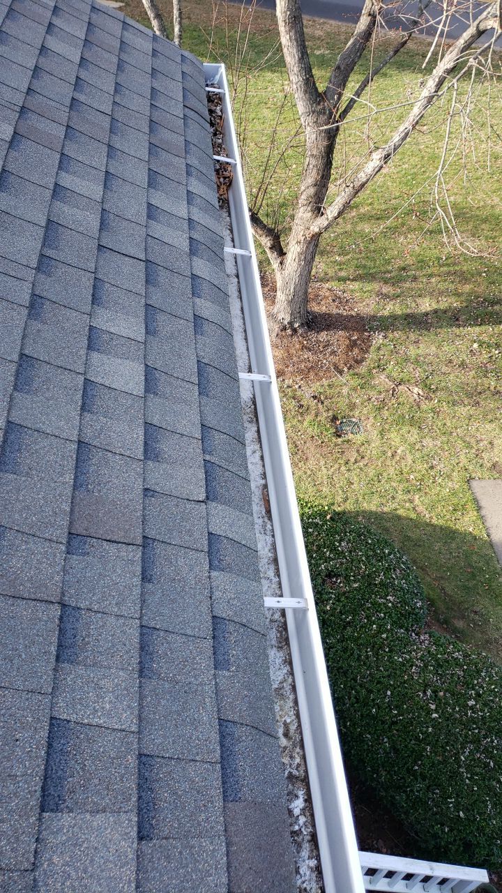 Gutter Cleaning using water by Power Wash Masters LLC