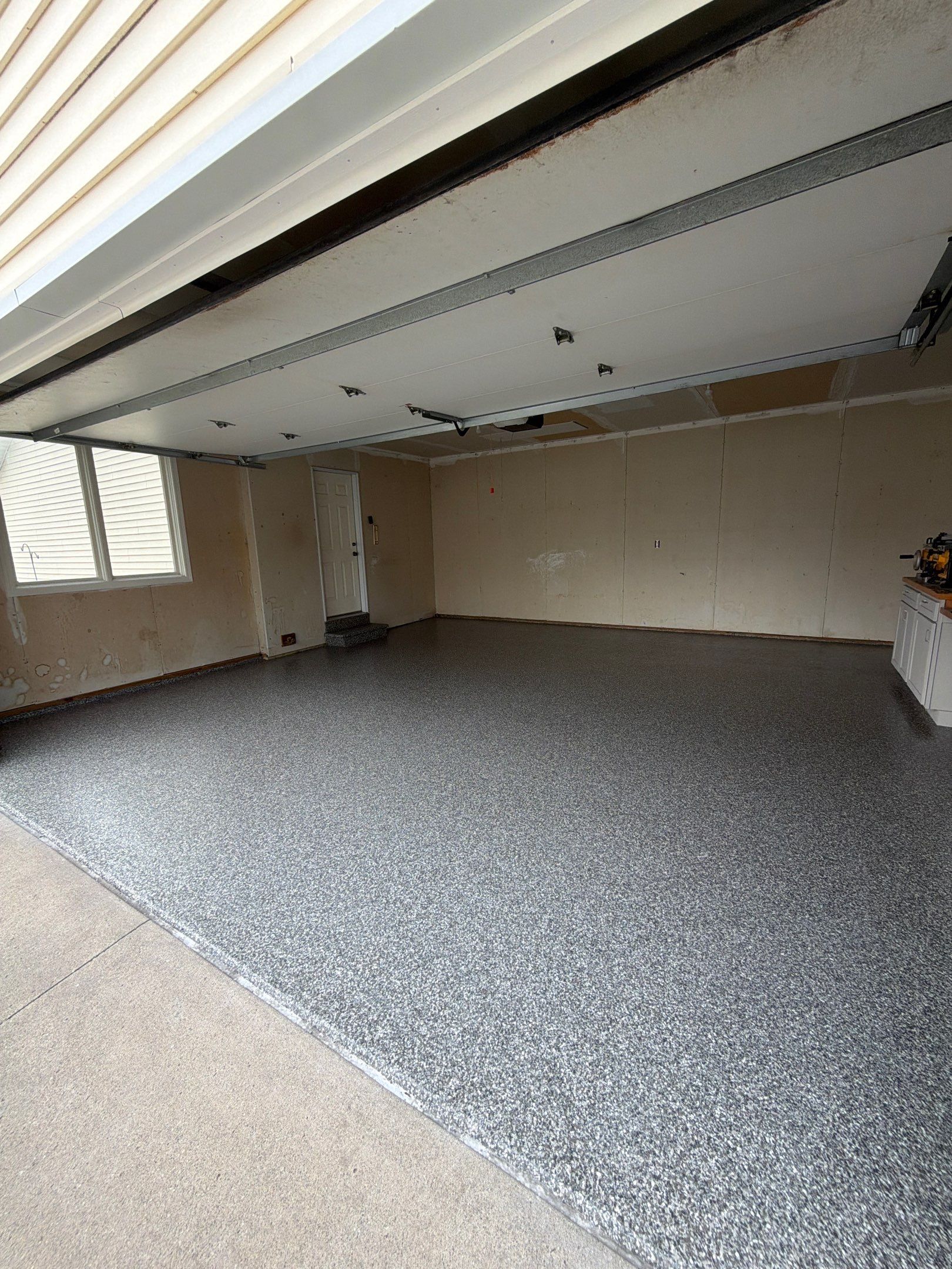 Ames Garage Floor Coating - Epoxy Replacement by Revival Concrete Coatings