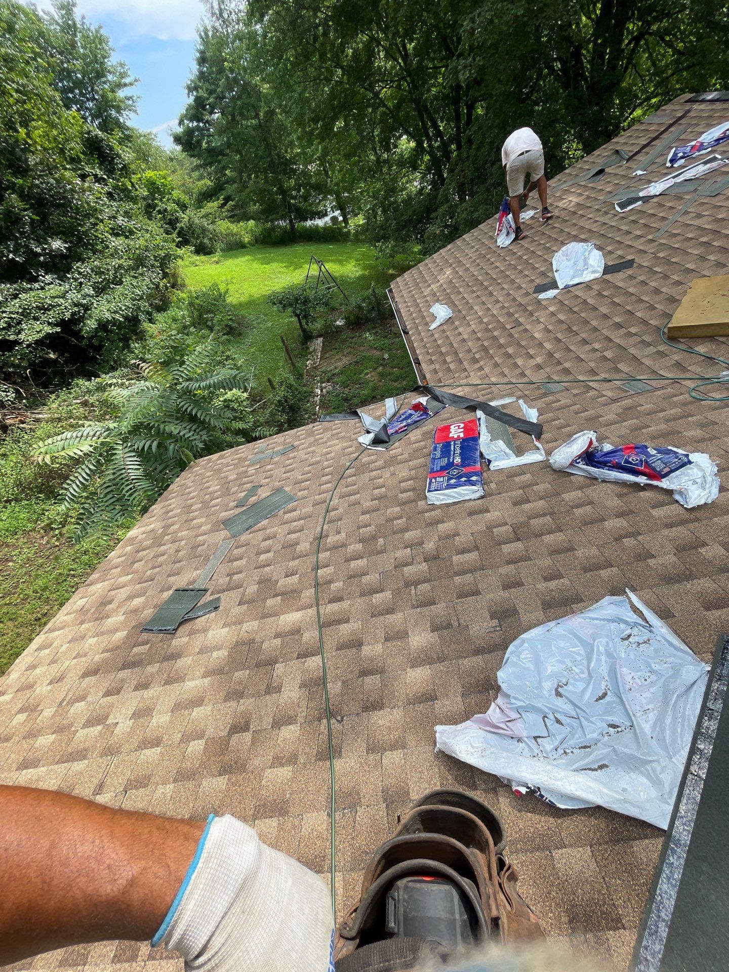 Residential Roofing Installation using GAF Timberline HDZ Shakewood by Rainstoppers Roofing