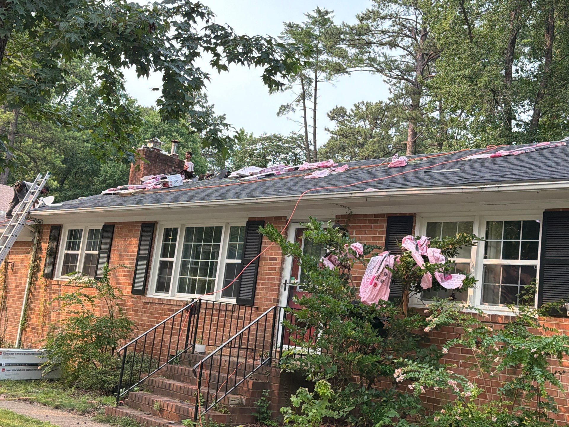 Asphalt Shingle Roof Replacement and Gutter Installation in Richmond by Cade Construction