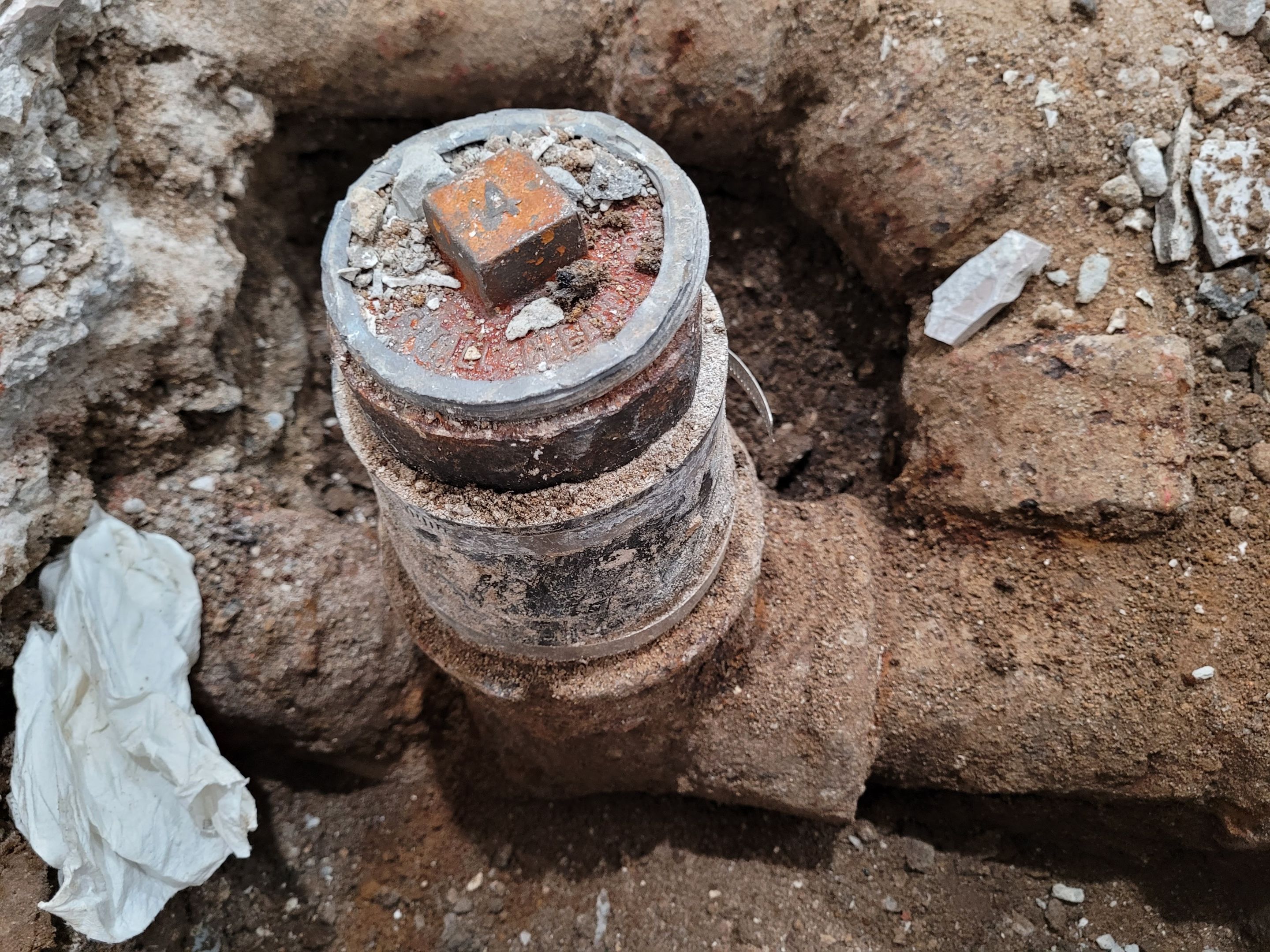 The replacement of a crumbing leaky house u-trap in basement by WG's Remodeling Inc