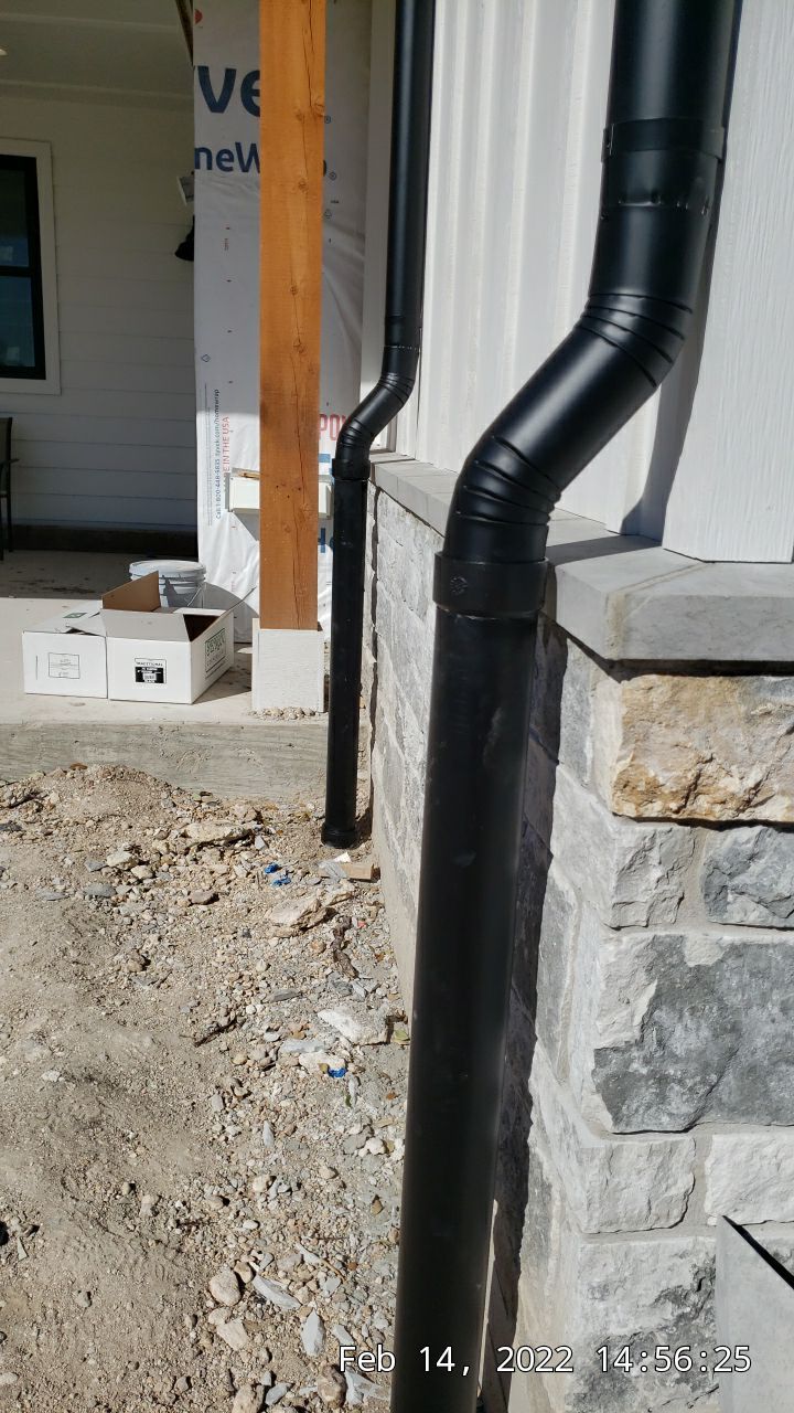 30K gallon mangrove green tank for residential rain water harvesting, Dripping Springs, TX by Hill Country Rain Water
