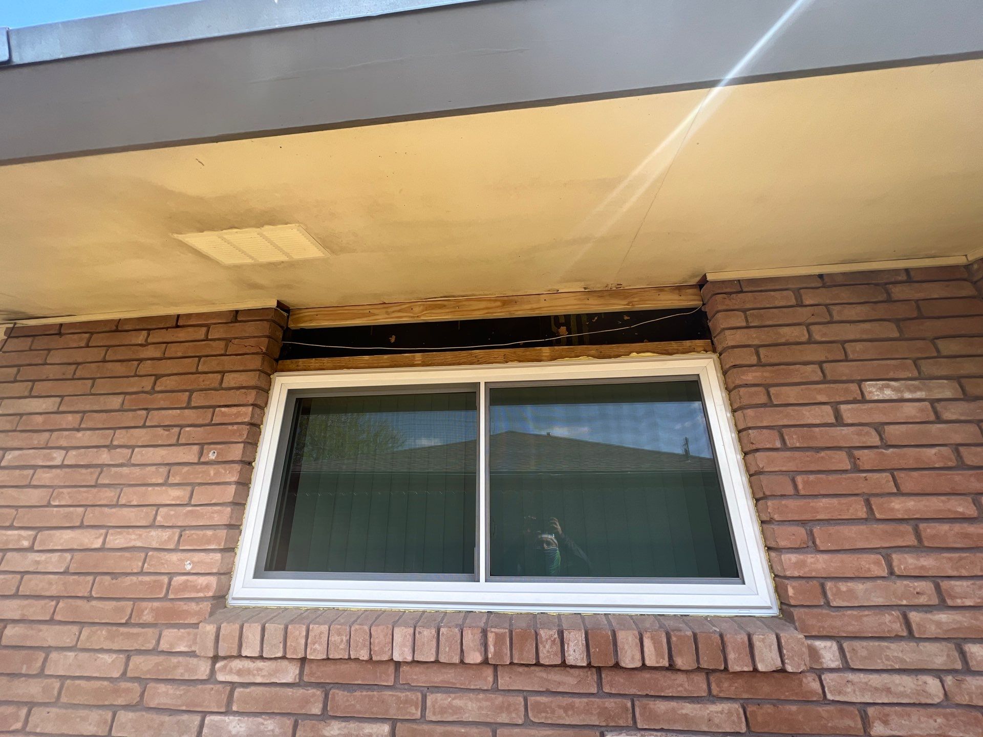 Windows in Brick with a Bay Window by Bayfront Roofing and Construction