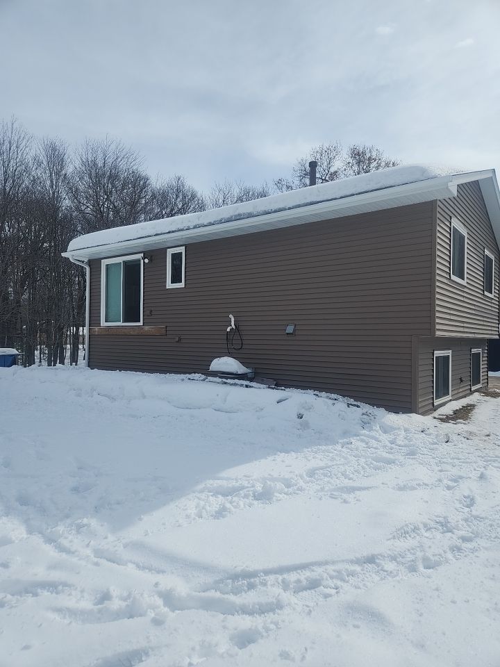 5" White Gutters in Becker by Next Level Seamless Gutters / Exteriors Inc.