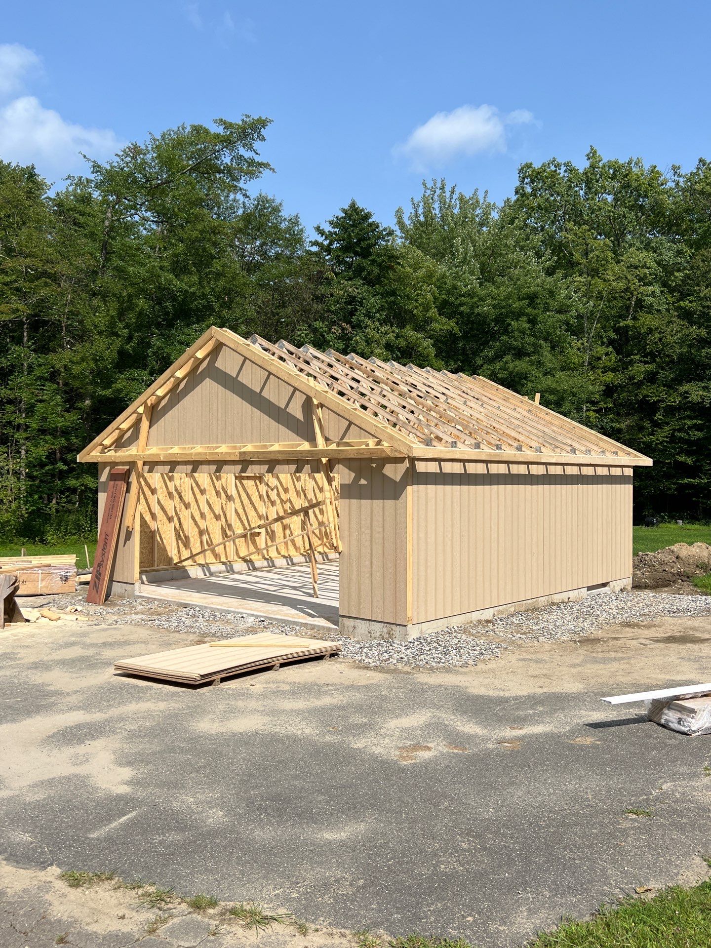 Two-Car Garage using LP SmartSide Panel Siding by Chagnon Building & Remodeling LLC
