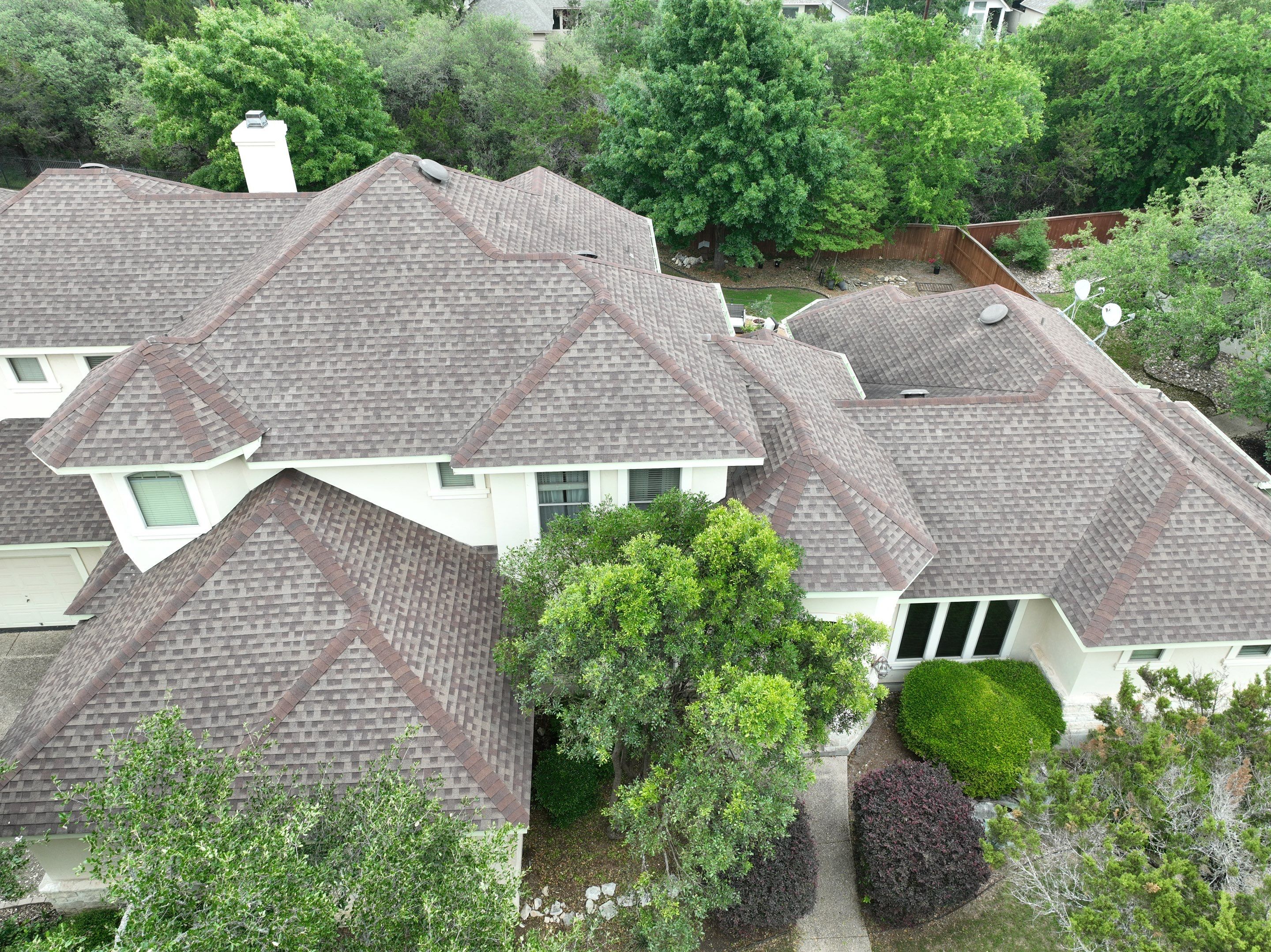 Residential Roof Replacement using 30 Year Laminate Shingles with High Profile Ridge by Premier Roofing and Contracting
