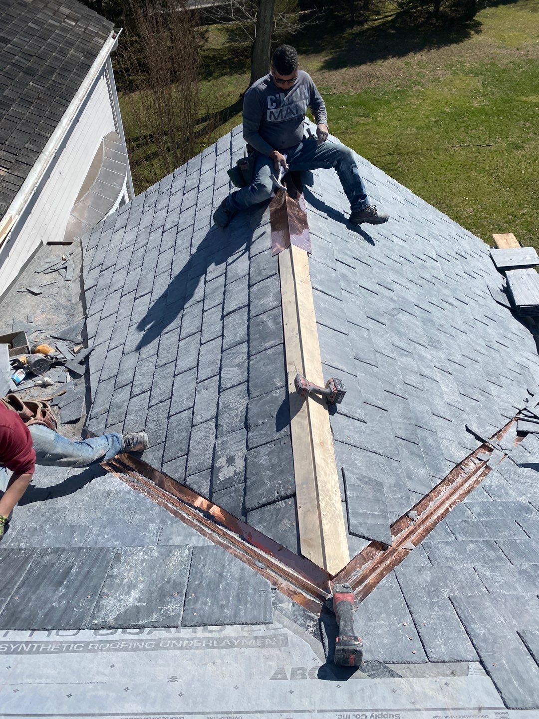 Residential Roofing Installation using Vermont Slate by A Plus Exterior
