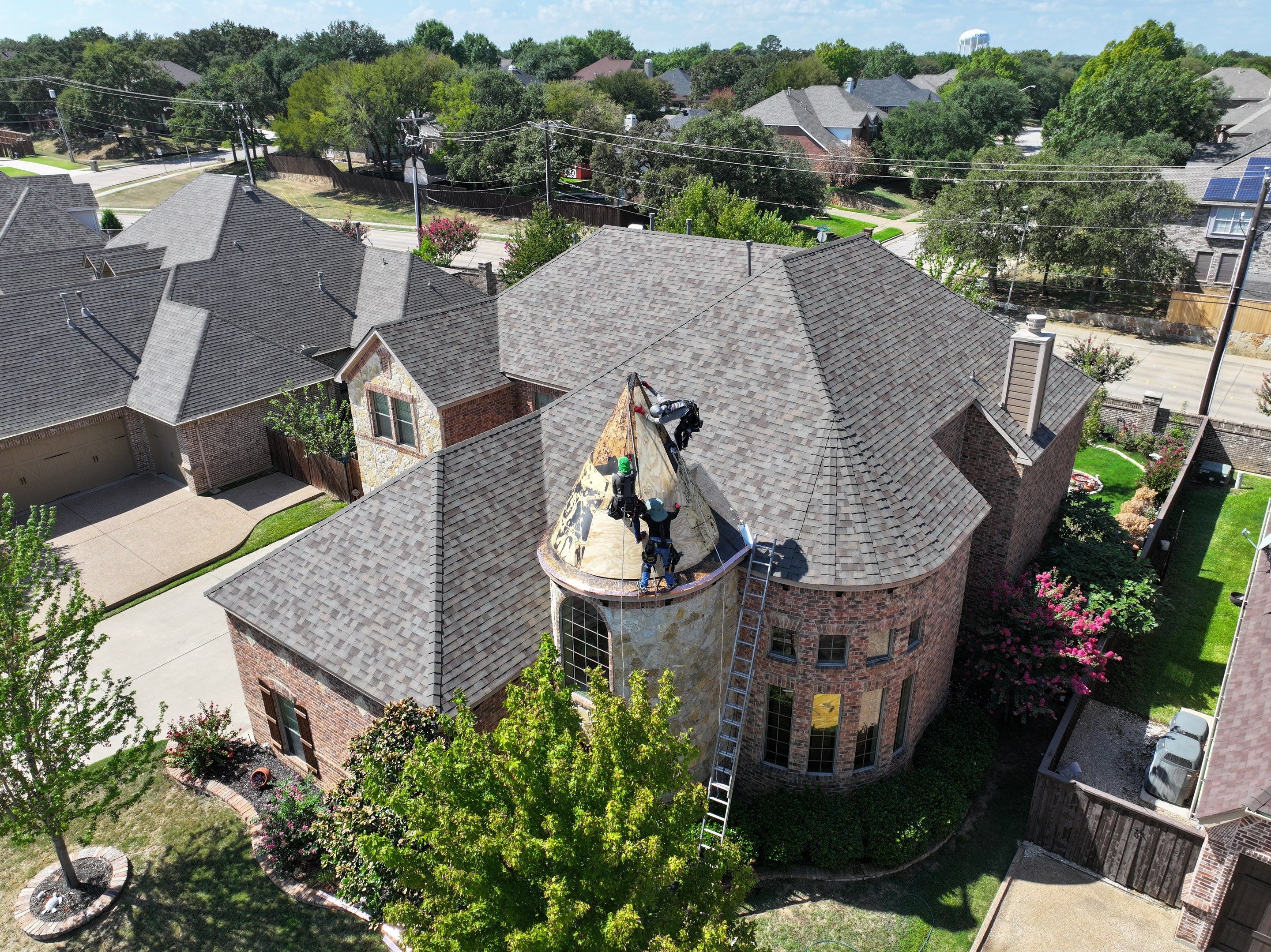 Installing Custom copper turret and Malarkey Vista Class 4 shingles Hail Damage Upgrade by Becker Roofing and Exteriors