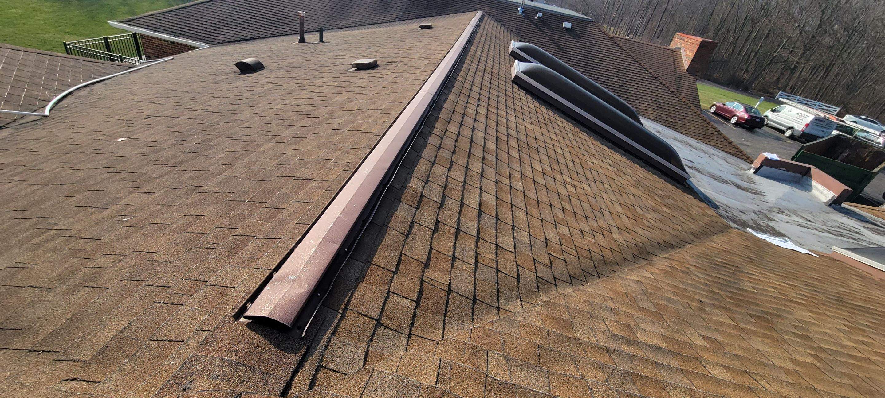 Skylight removal and install  by Absolute Roofing and Construction