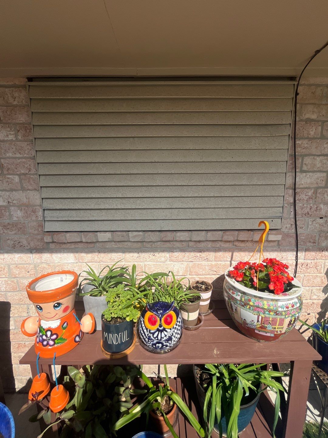 Colored Vinyl Windows to blend into brick by Bayfront Roofing and Construction