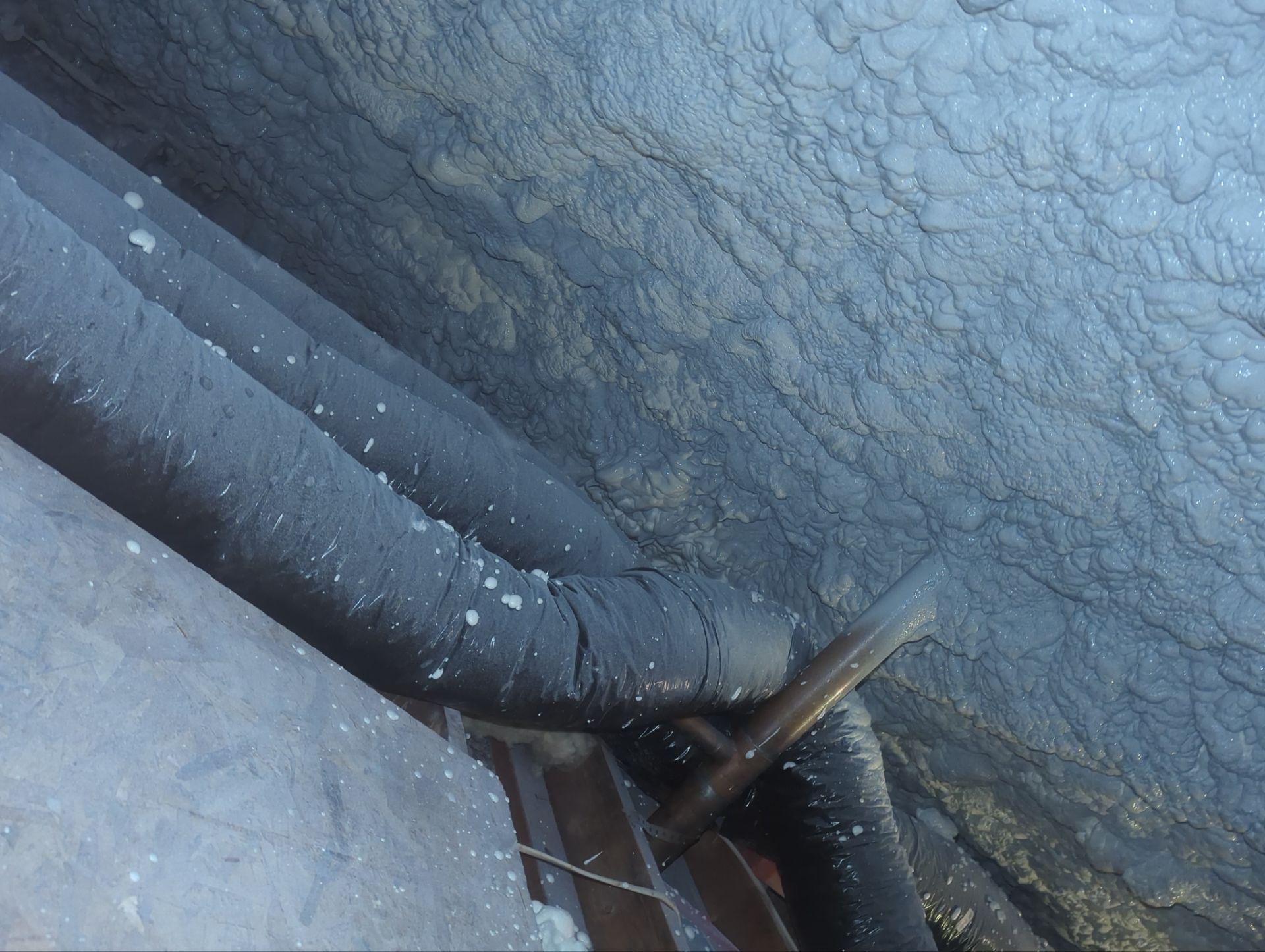 Attic Retrofit using open cell spray foam by NYS Foam & Energy