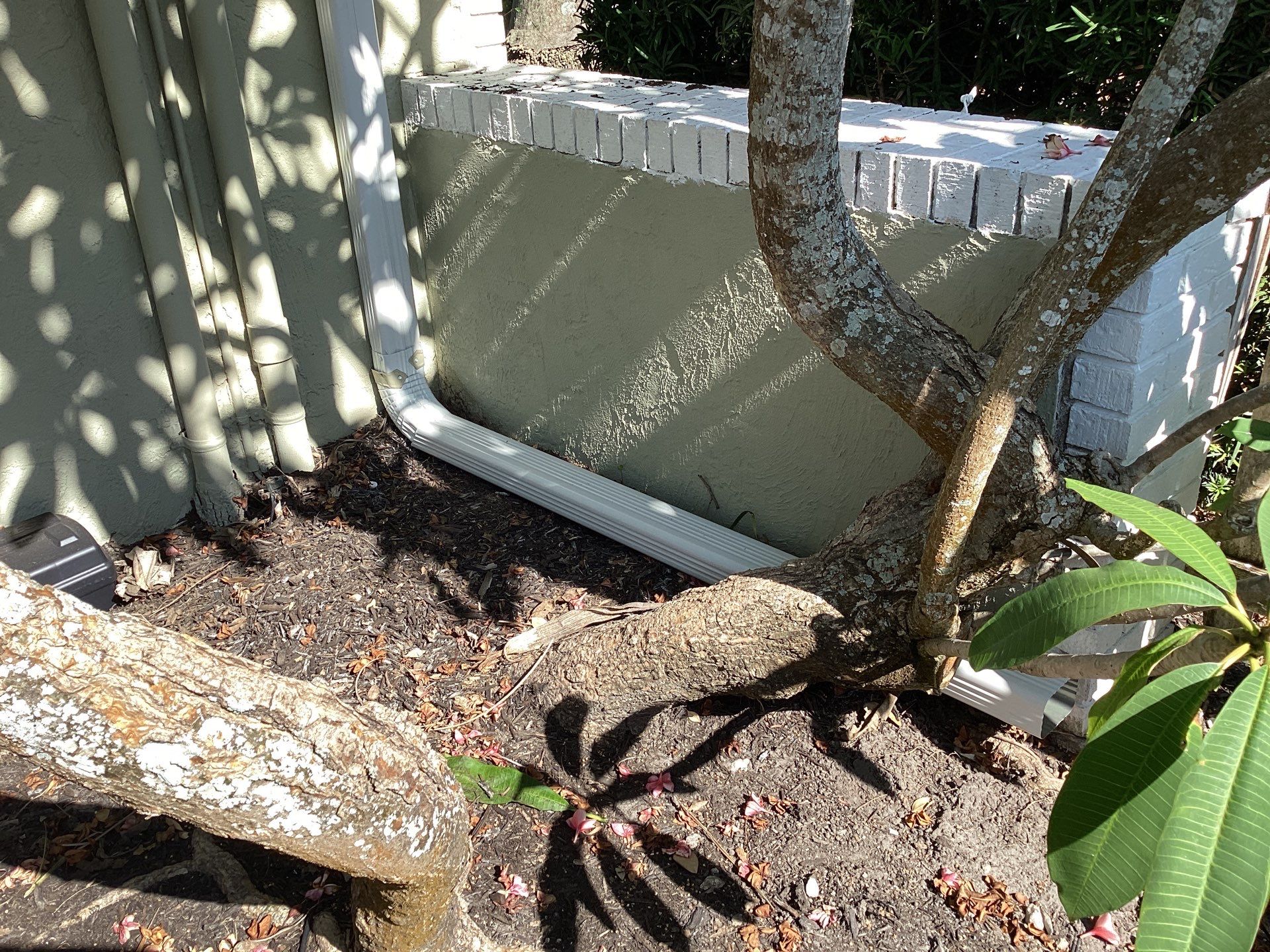 White Gutter Installation in Sarasota FL by Gutter Professors