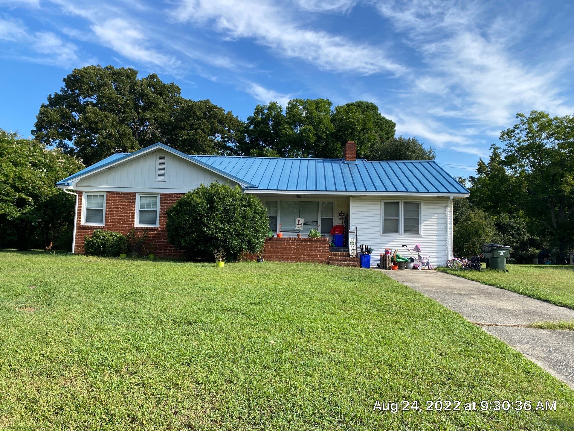 Carolina Blue Standing Seam Roof by Just In Time Roofing and Restoration