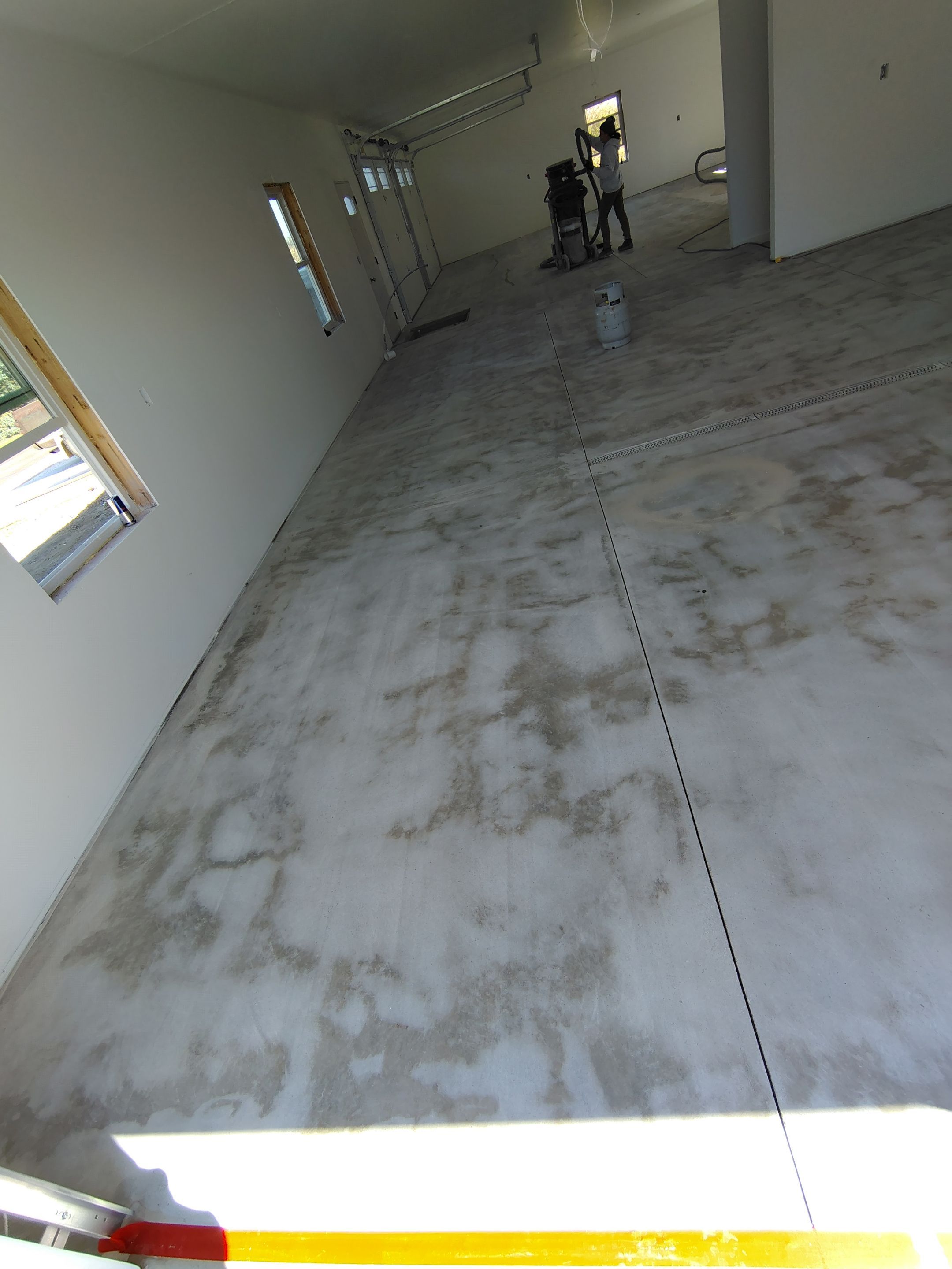 Custom Garage and Basement Epoxy Floor Coating in Menno by Select Painting, Coatings & Garage Cabinets
