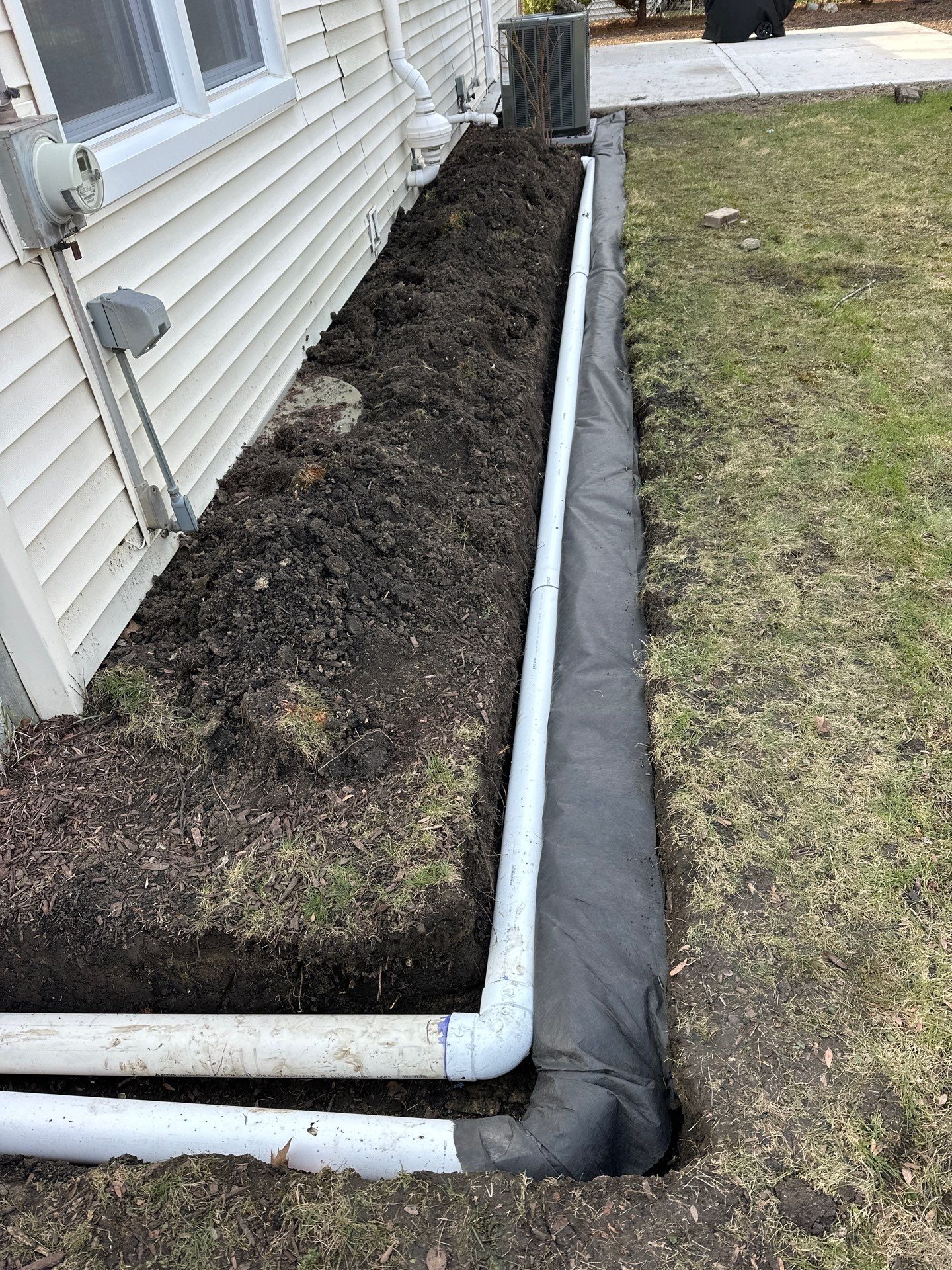 French drain and Sump pump reroute to flo well by A&N