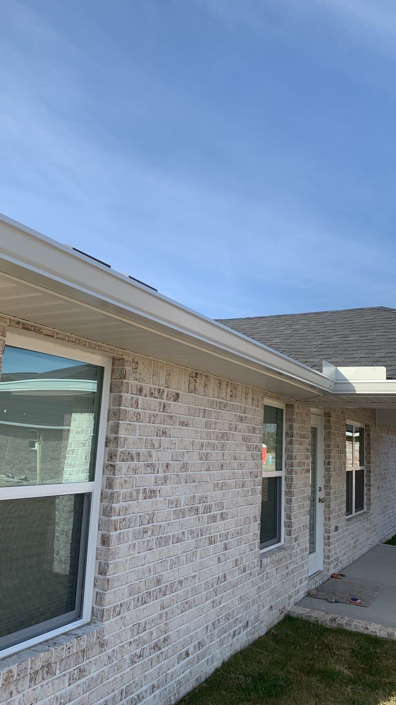 Seamless Gutter Installation Using White K-Style Gutters by Gutter Professors