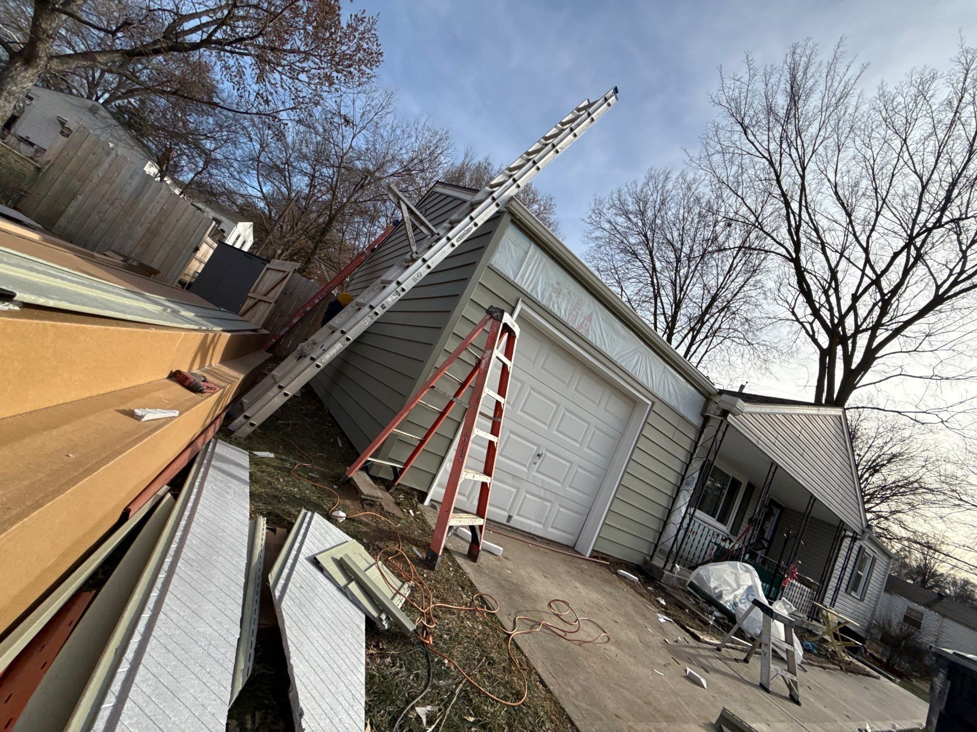 A whole new look for this Gladstone Home  by EEC  Windows, Siding & Roofing 