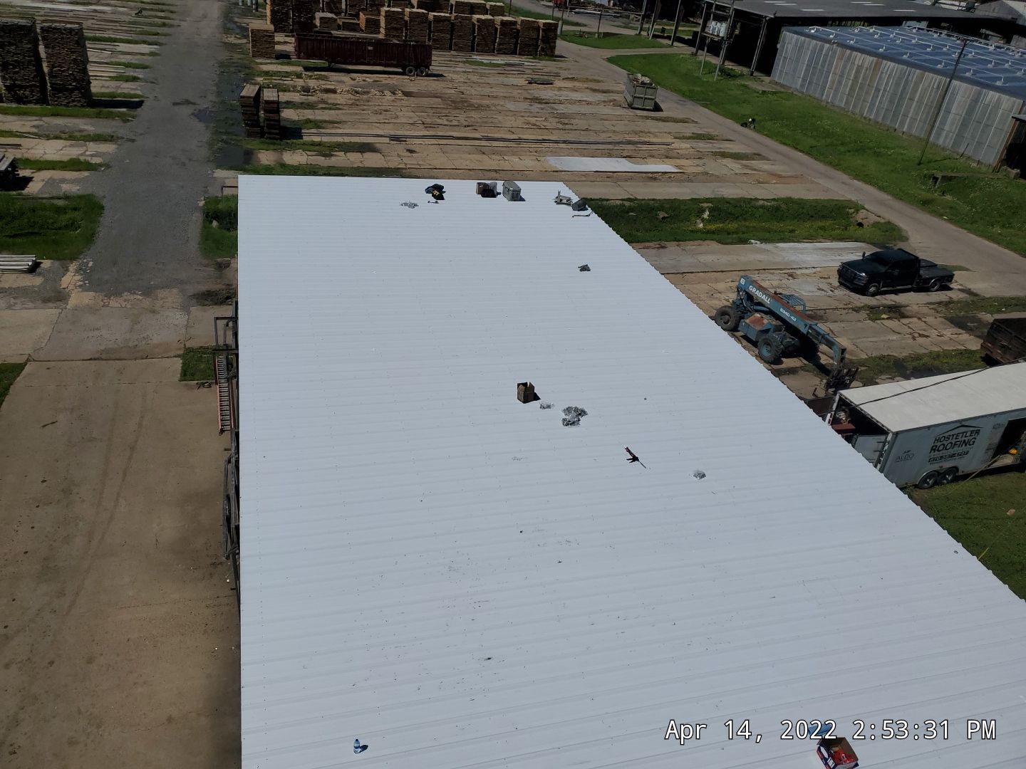 Commercial Roofing Installation using Aluminum Roofing panels by Hostetler Roofing