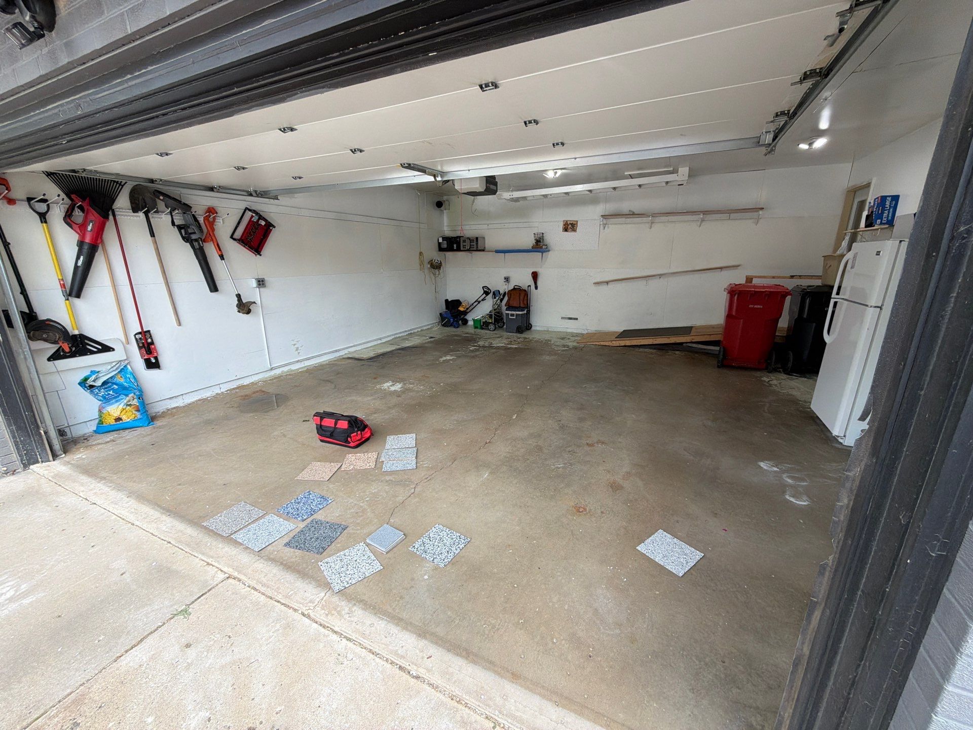 Yankton Garage Concrete Coating With Feather Gray Decorative Chips by Select Painting, Coatings & Garage Cabinets