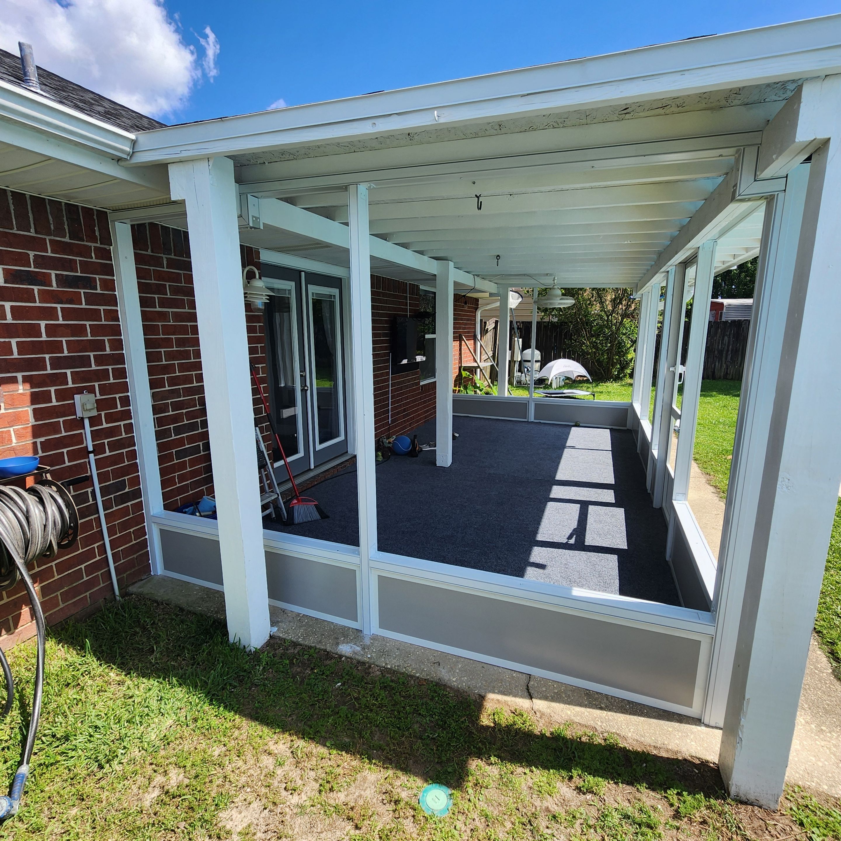 Screen Room Built Under Existing Roof by Titan Sunrooms