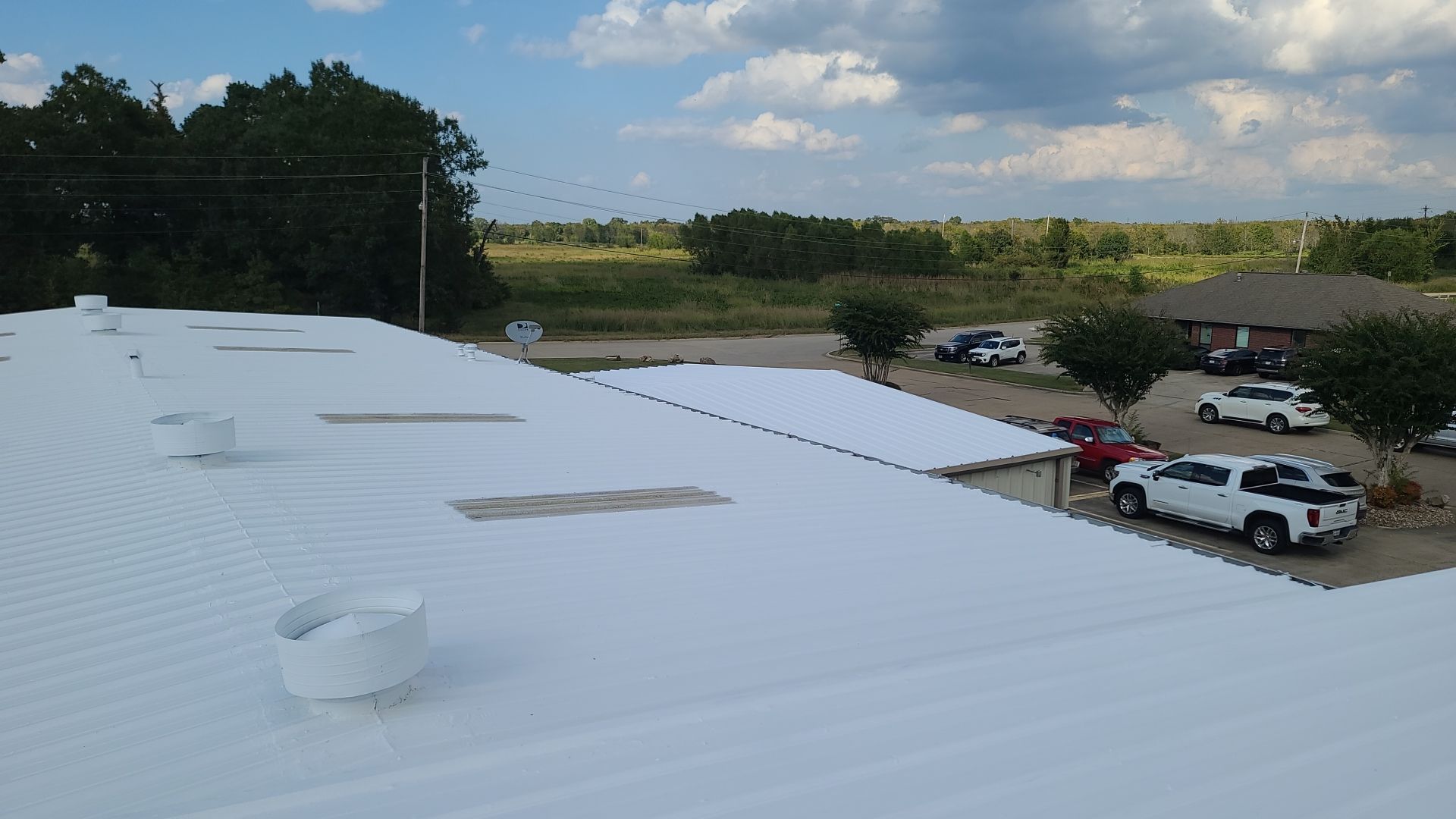 Commercial Metal Restoration System using Aldocoat Coatings by Hostetler Roofing