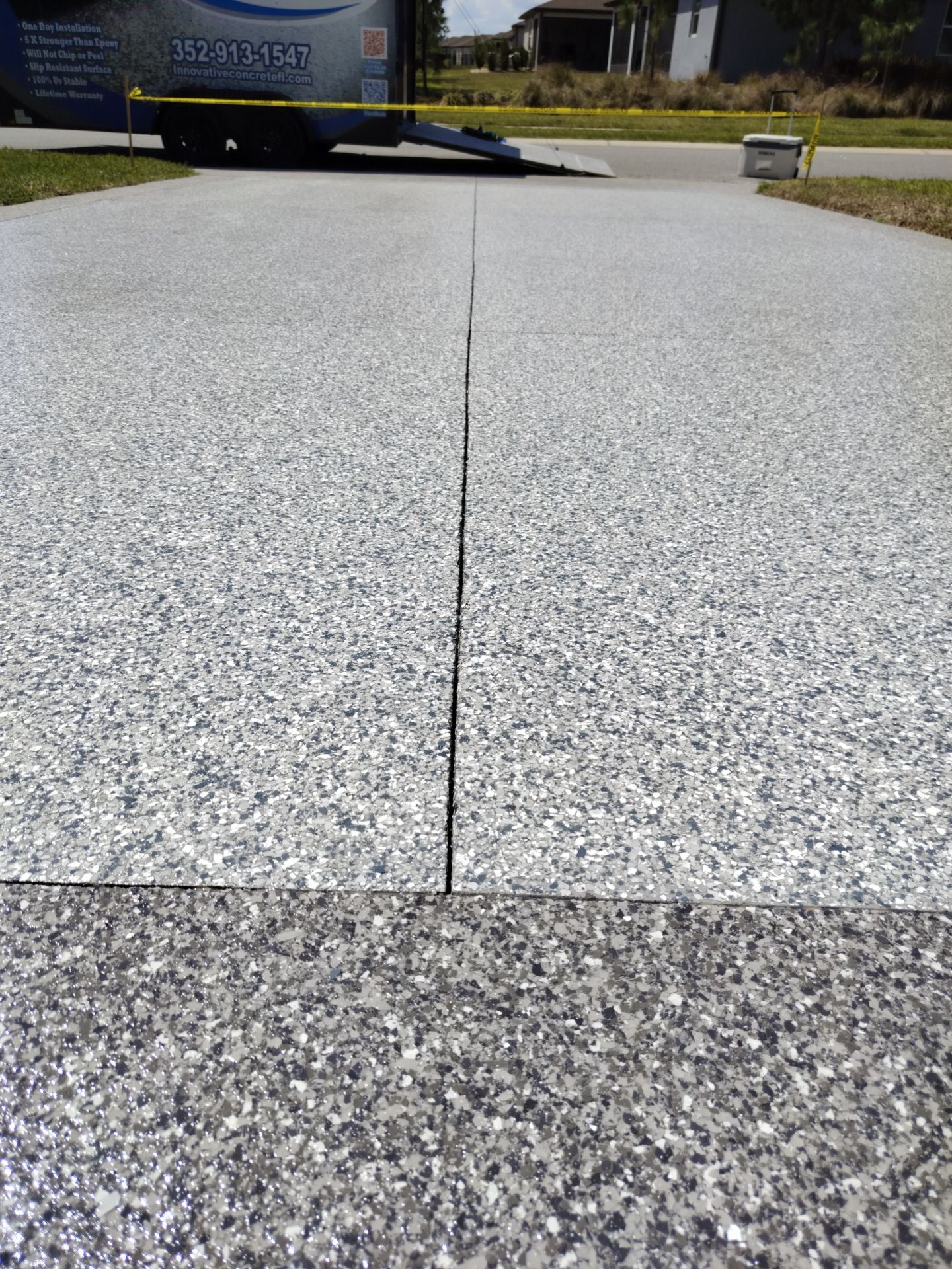 Driveway and Sidewalk in Slatestone with Silvercreek Border by Innovative Concrete Coatings 