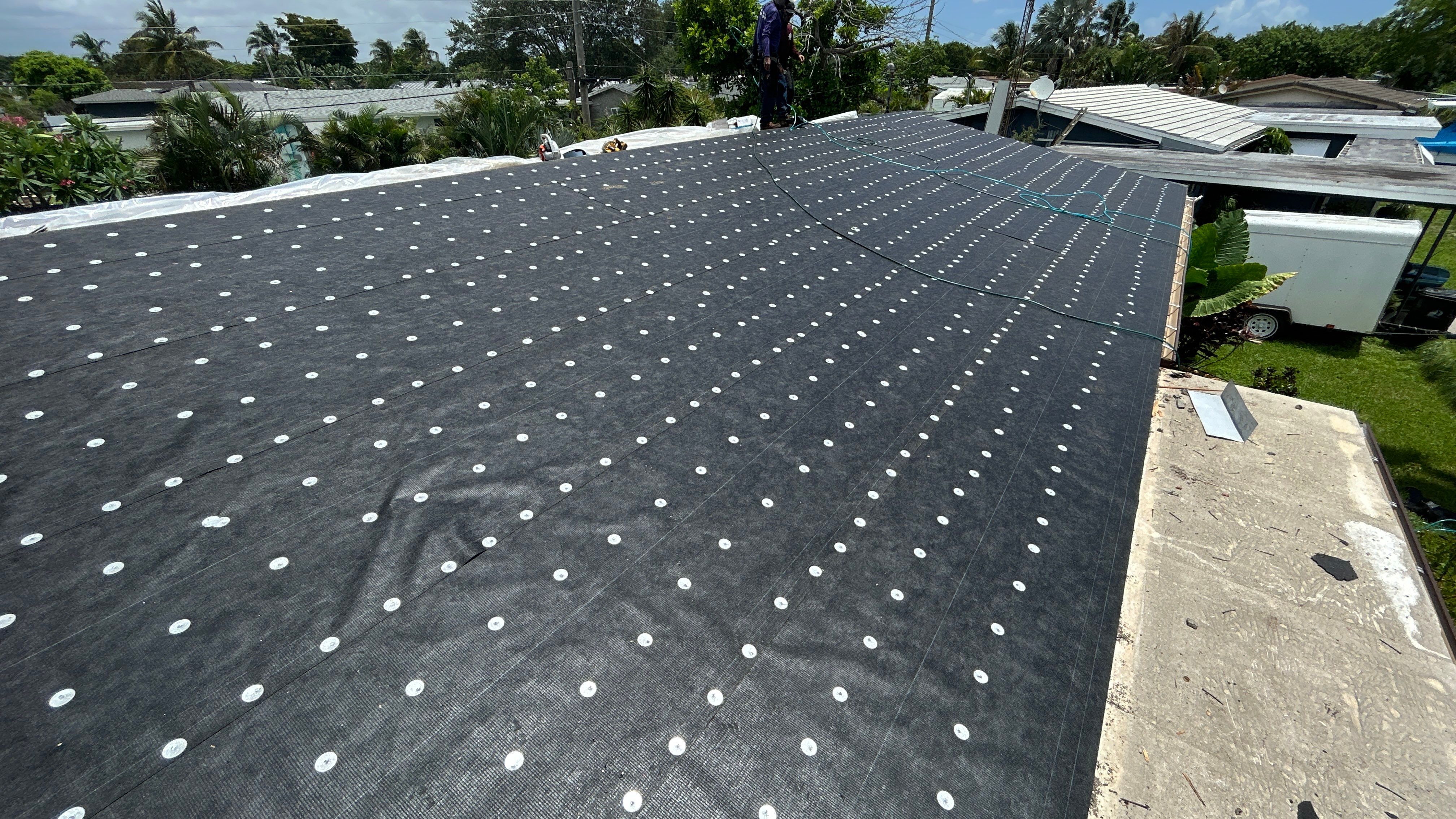 Residential Roofing Installation using Polyglass XFR and Polyanchor by Nast Roofing