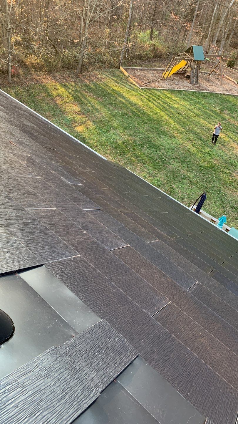 Tesla Solar Roof Replacement by American Home Contractors