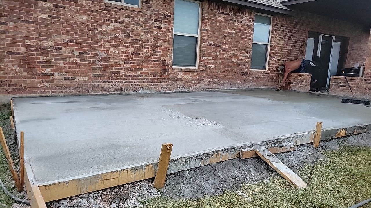 Concrete slab with Pergola by Clays Services Inc
