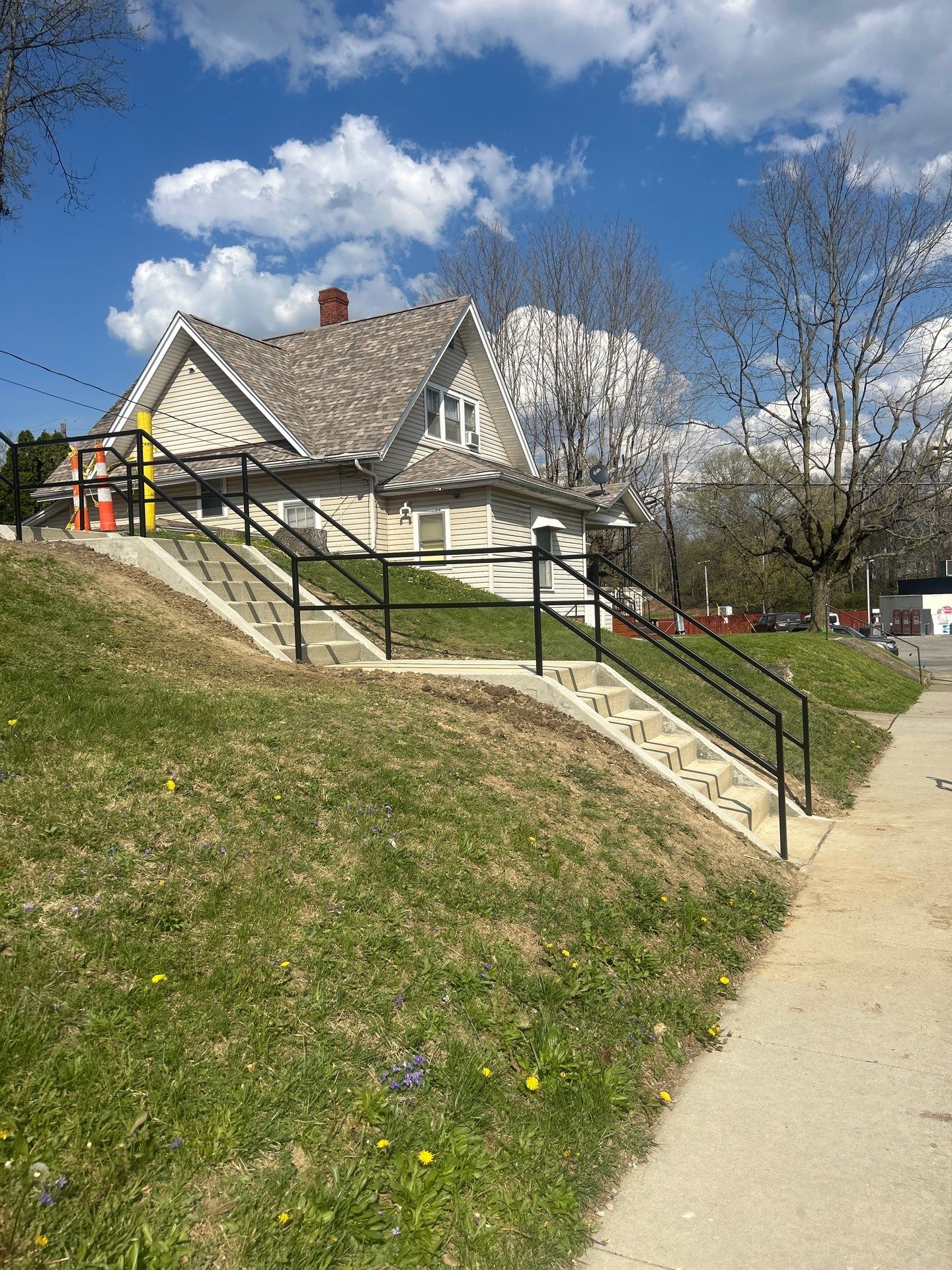 Concrete Staircase and Metal Handrail Installation in Sunbury by Concrete One Construction