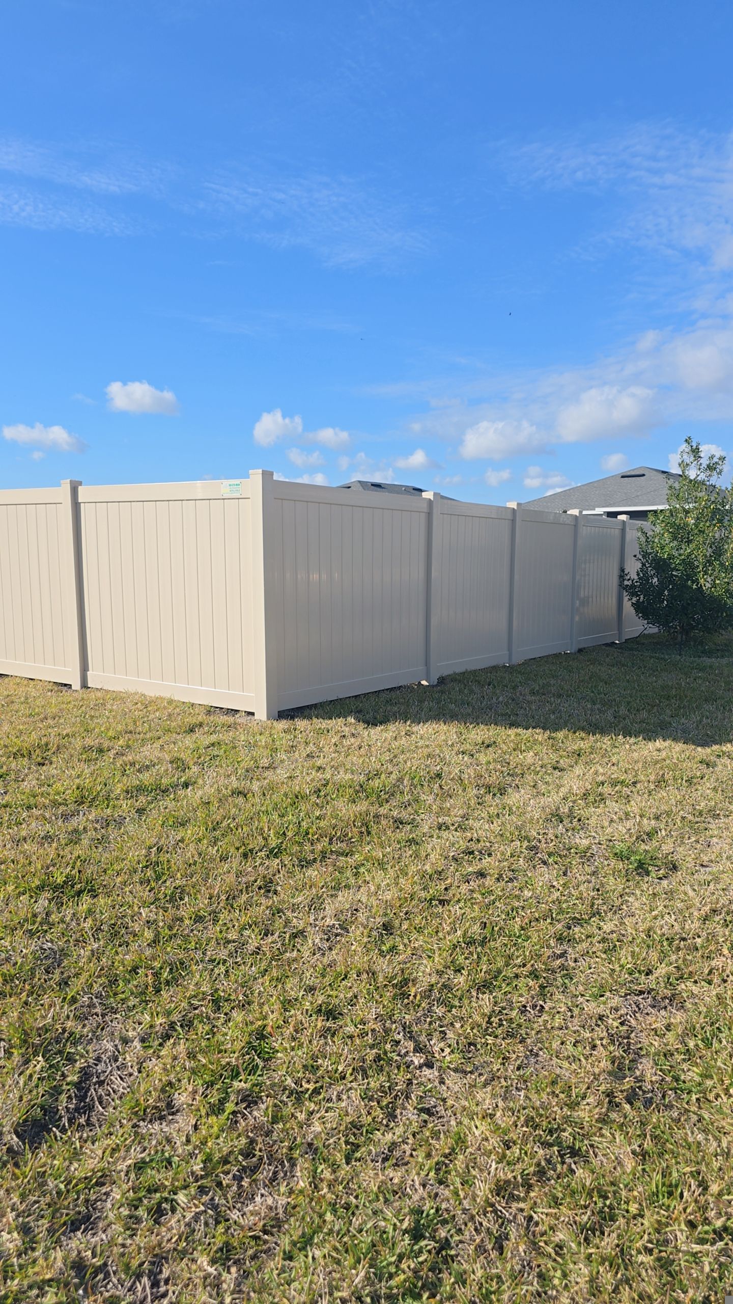 Tan Vinyl Fence in West Port by True Fence LLC