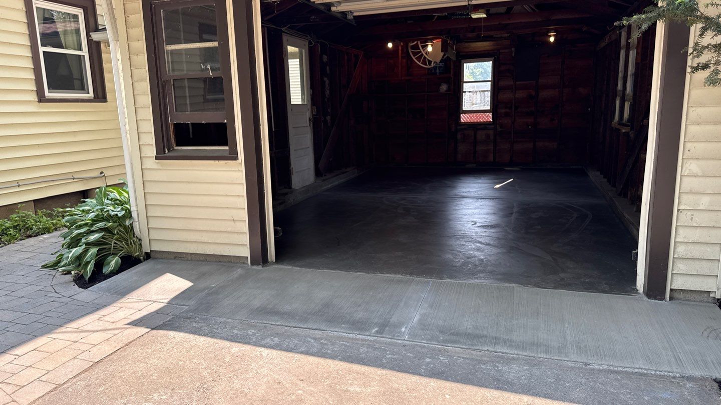 Concrete garage floor replacement  by NG Masonry & Construction LLC