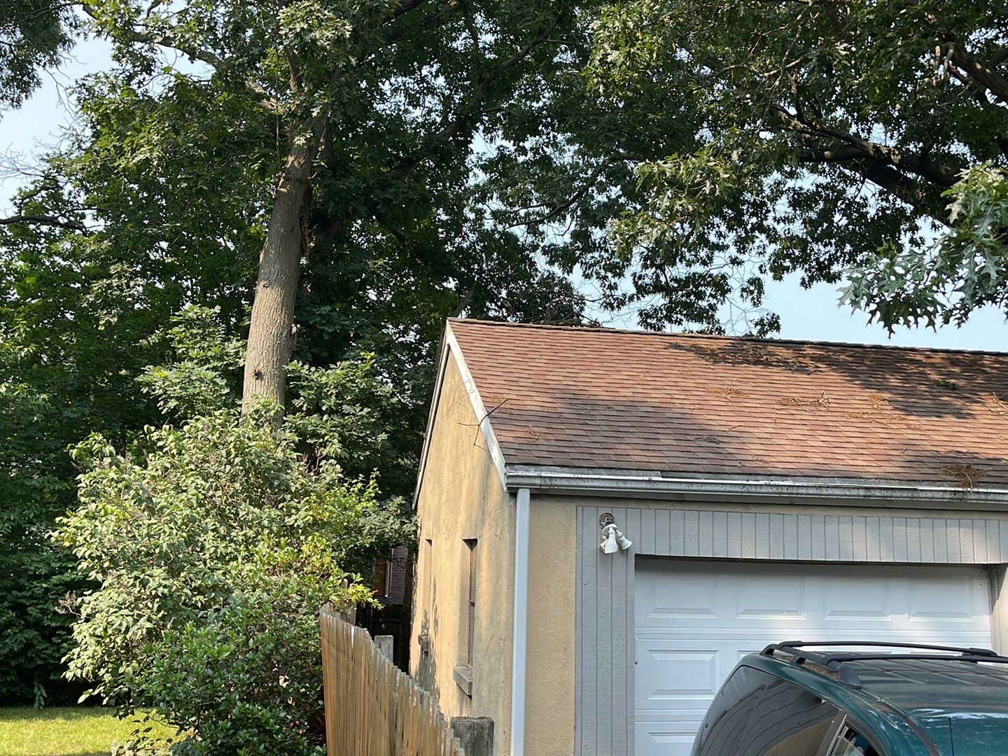 Gutter Installation using 5k White gutters by A Plus Exterior