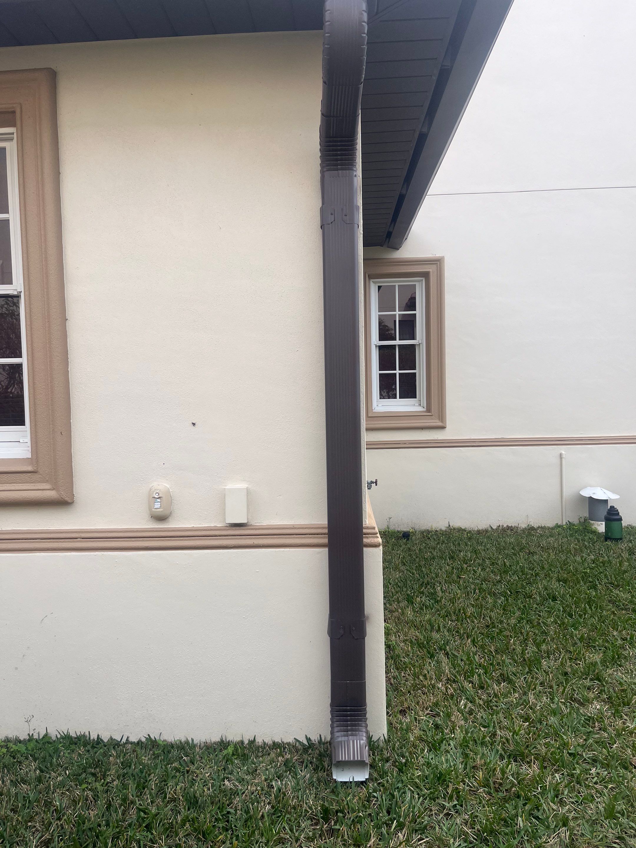 Musket Brown Seamless Gutters using Musket Brown Seamless Gutters in Cape Coral FL by Gutter Professors