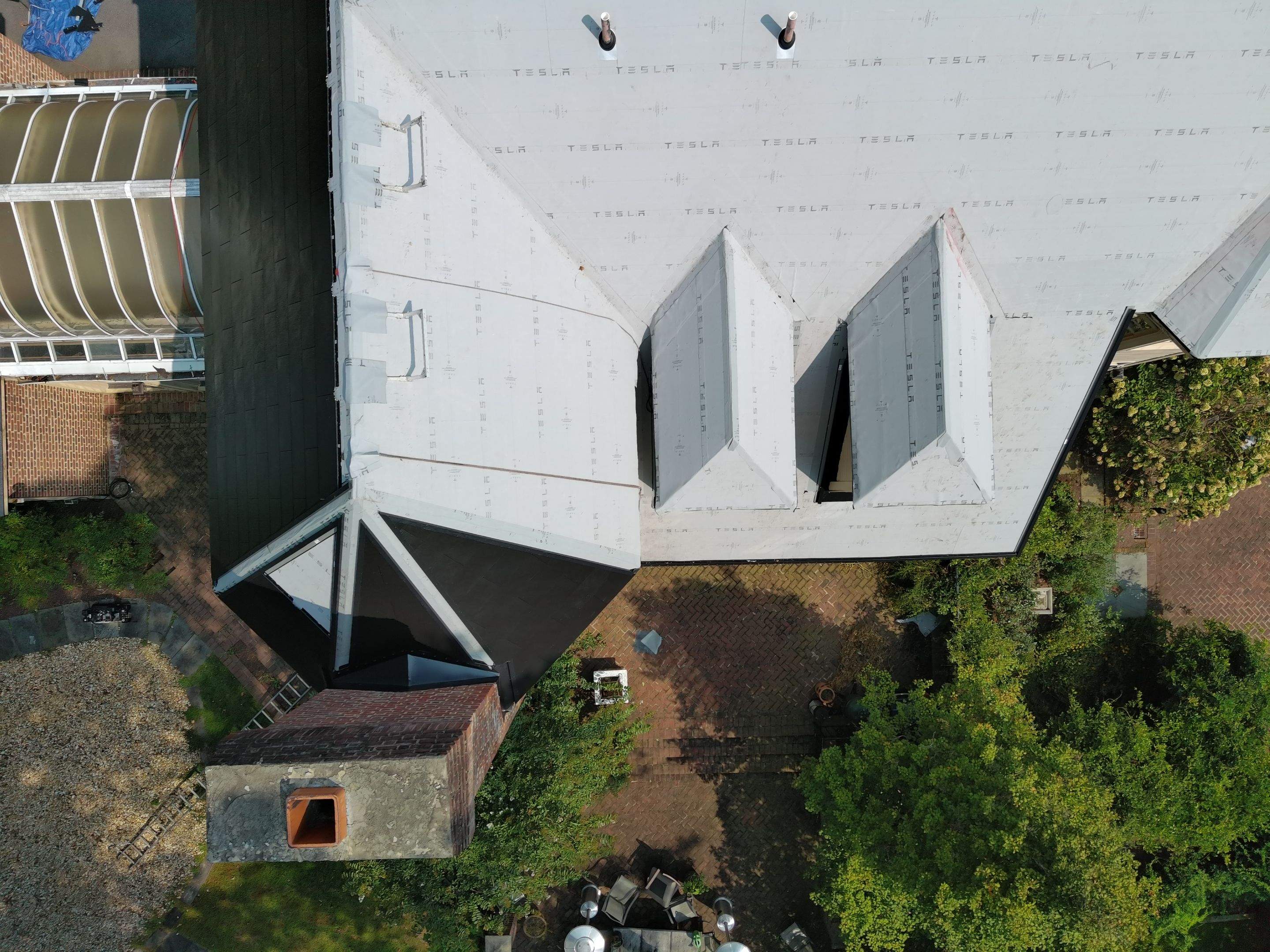 Extravagant Tesla Solar Roof in Maryland by American Home Contractors
