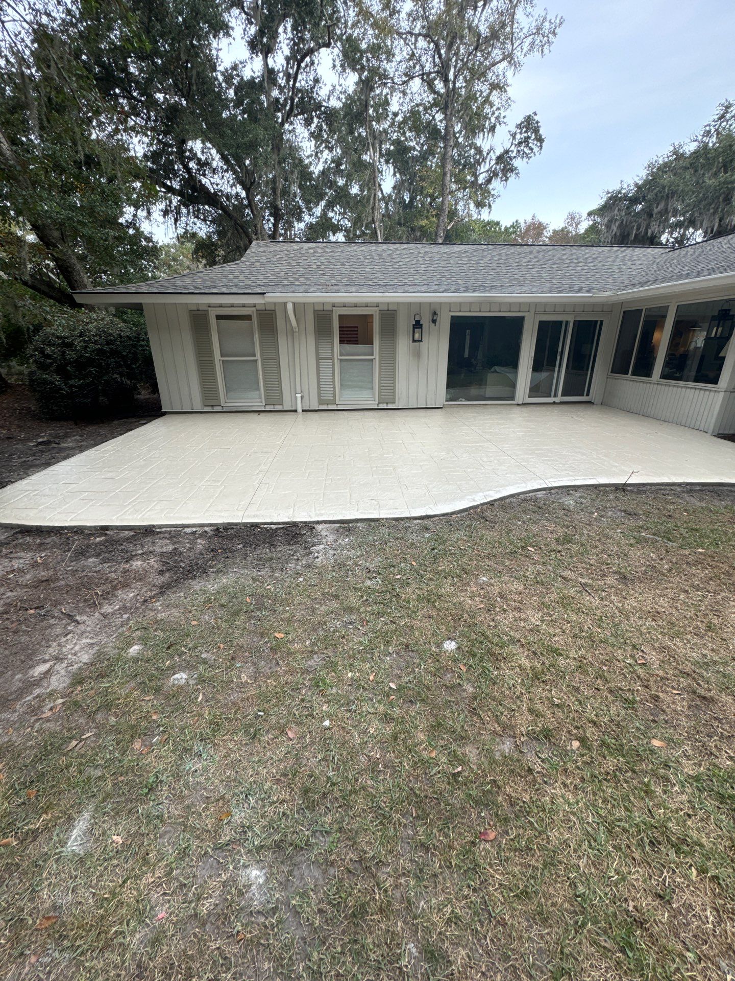Ashlar Slate Stamped Concrete Patio Installation in Hilton Head Island by Lowcountry Scapes, LLC
