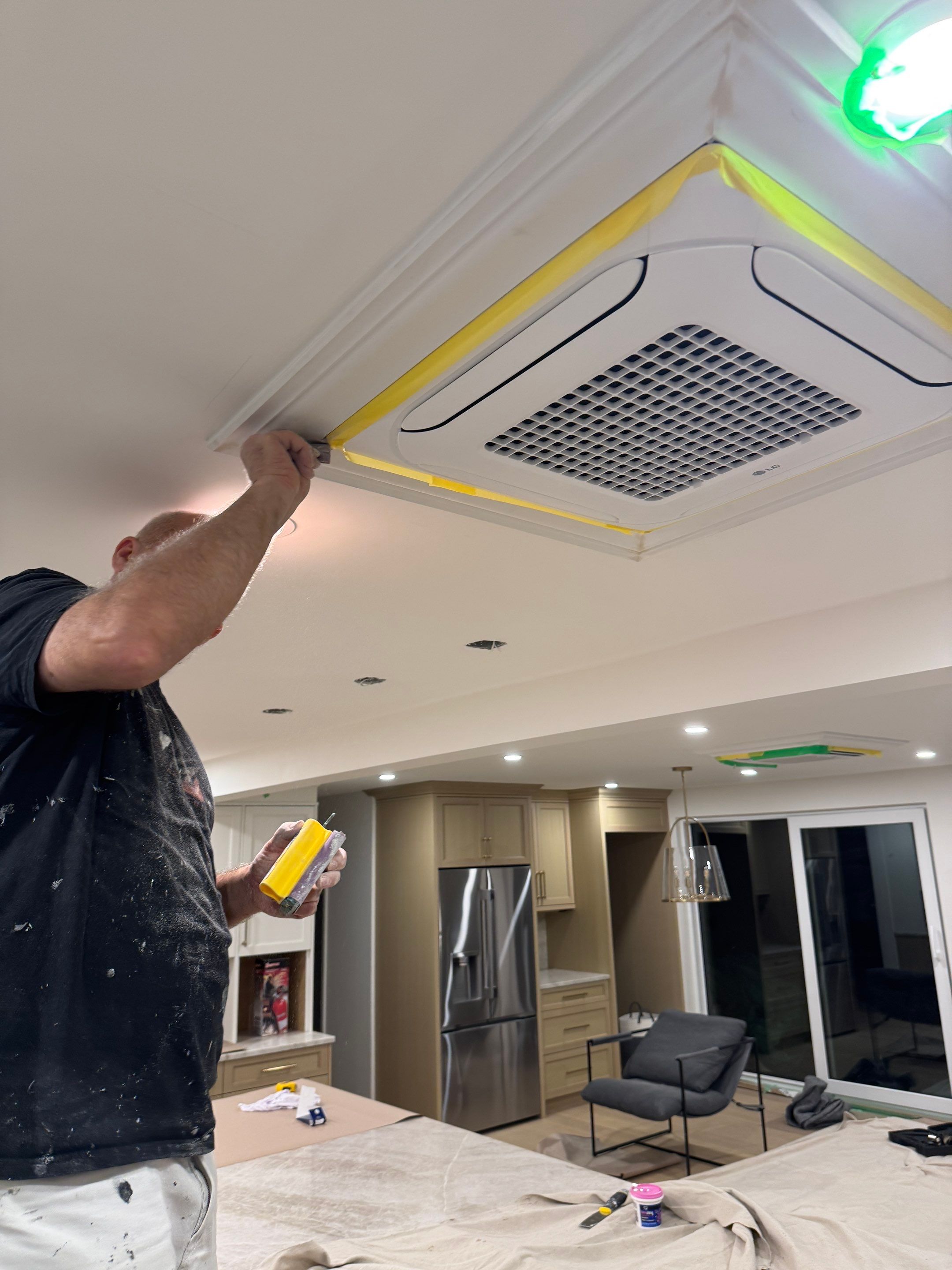 West Vancouver Custom Millwork: Heat Pump Trim & Window Finishing by YVR Construction Group