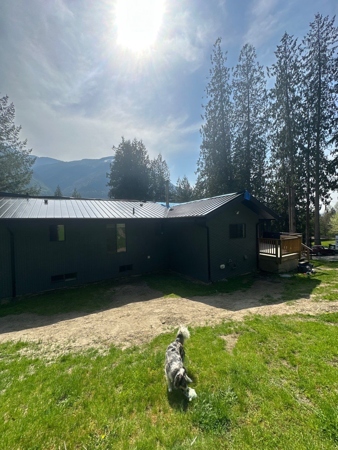 Residential ReRoofing Installation using 12" Prolok metal by Top Notch Roofing Inc