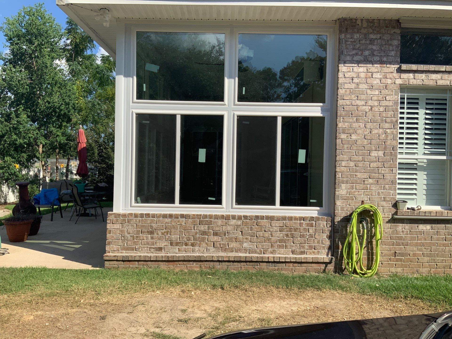 Screen Room Conversion to Glass Under  by Titan Sunrooms
