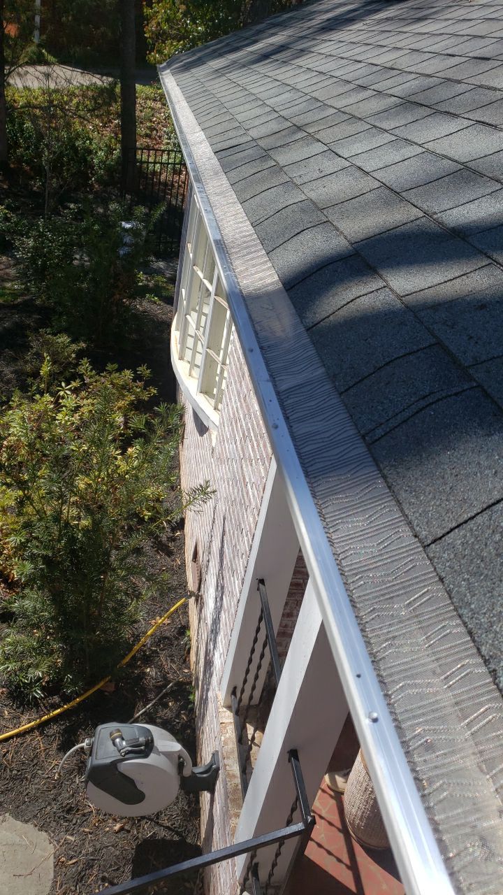 Gutter Cleaning using water by Power Wash Masters LLC