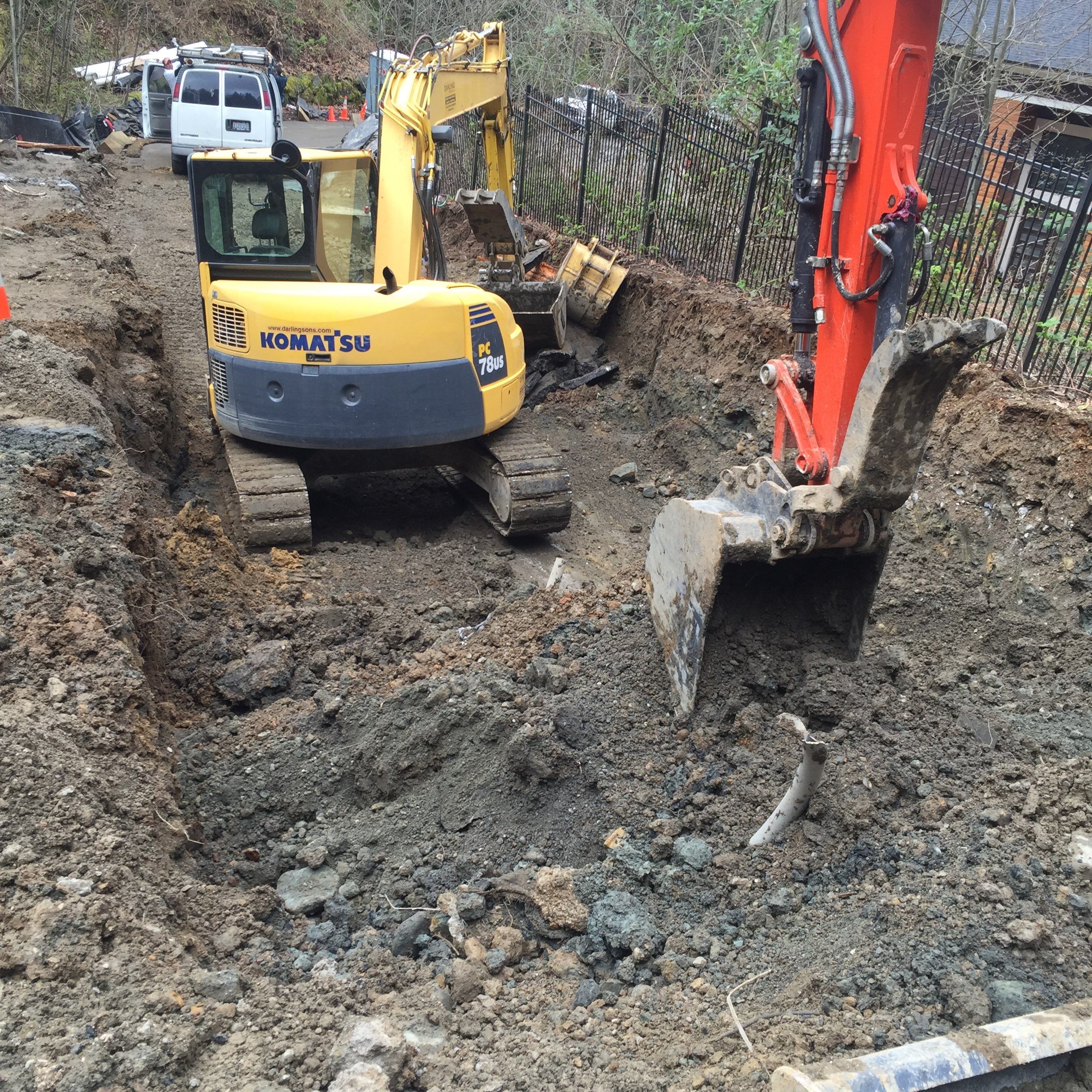 Asphalt Driveway and Stamped Concrete Patio Finish  by Jireh Asphalt & Concrete Inc 