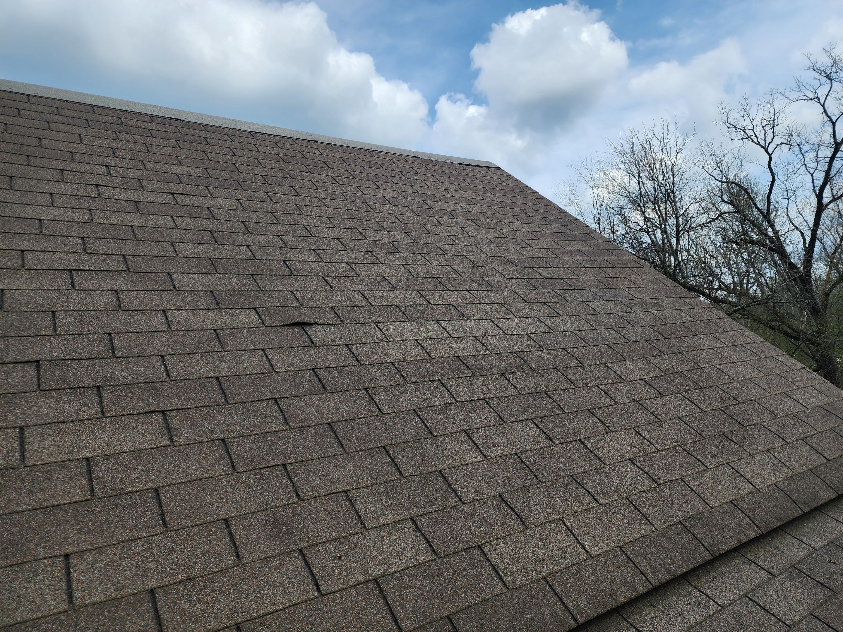 Residential Roofing Installation using 26 Gauge Colored Panels by Hostetler Roofing