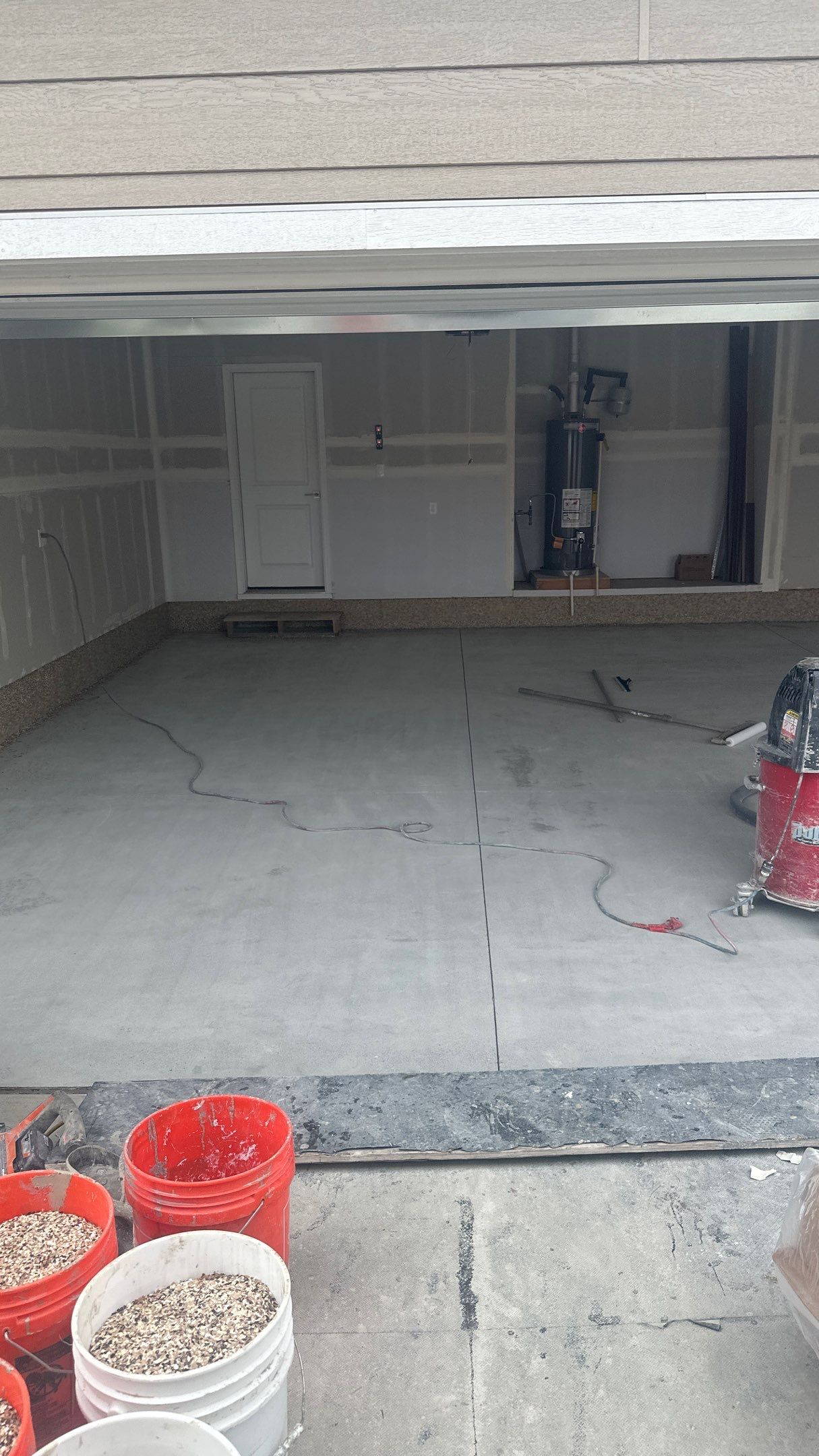Garage Transformation using Sandstone by Croc Coatings, LLC