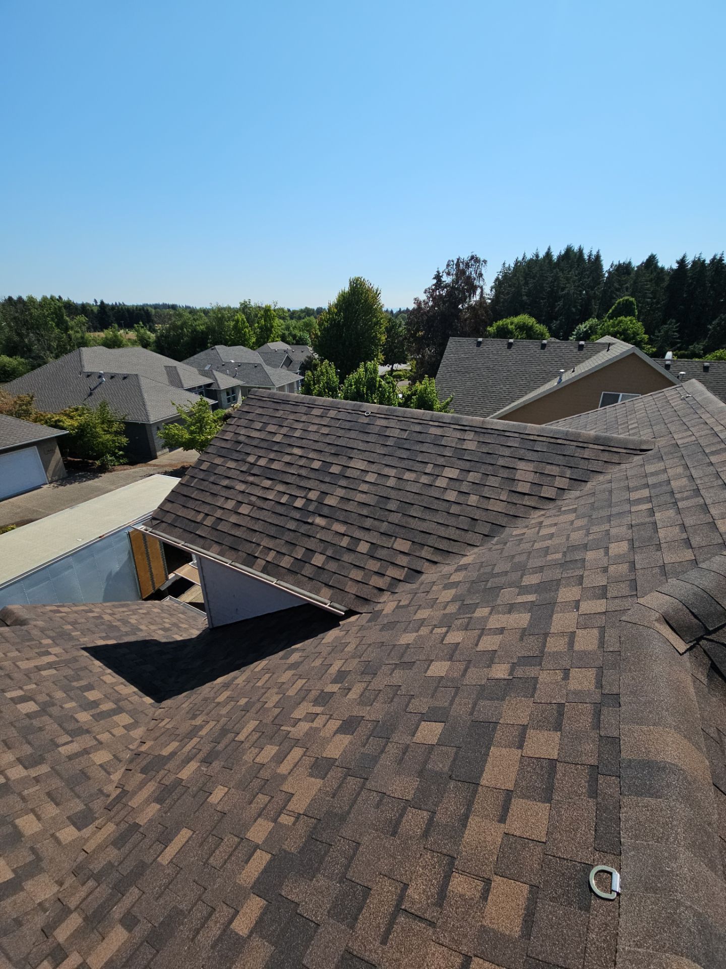 Residential Roofing Installation using IKO Dynasty (Color: Shadow Brown) by Orezona Building & Roofing Company, Inc.