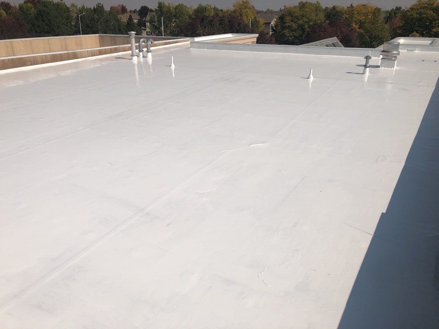 Commercial Roofing Installation using American Standard Coating - S  by A to Z Roofing