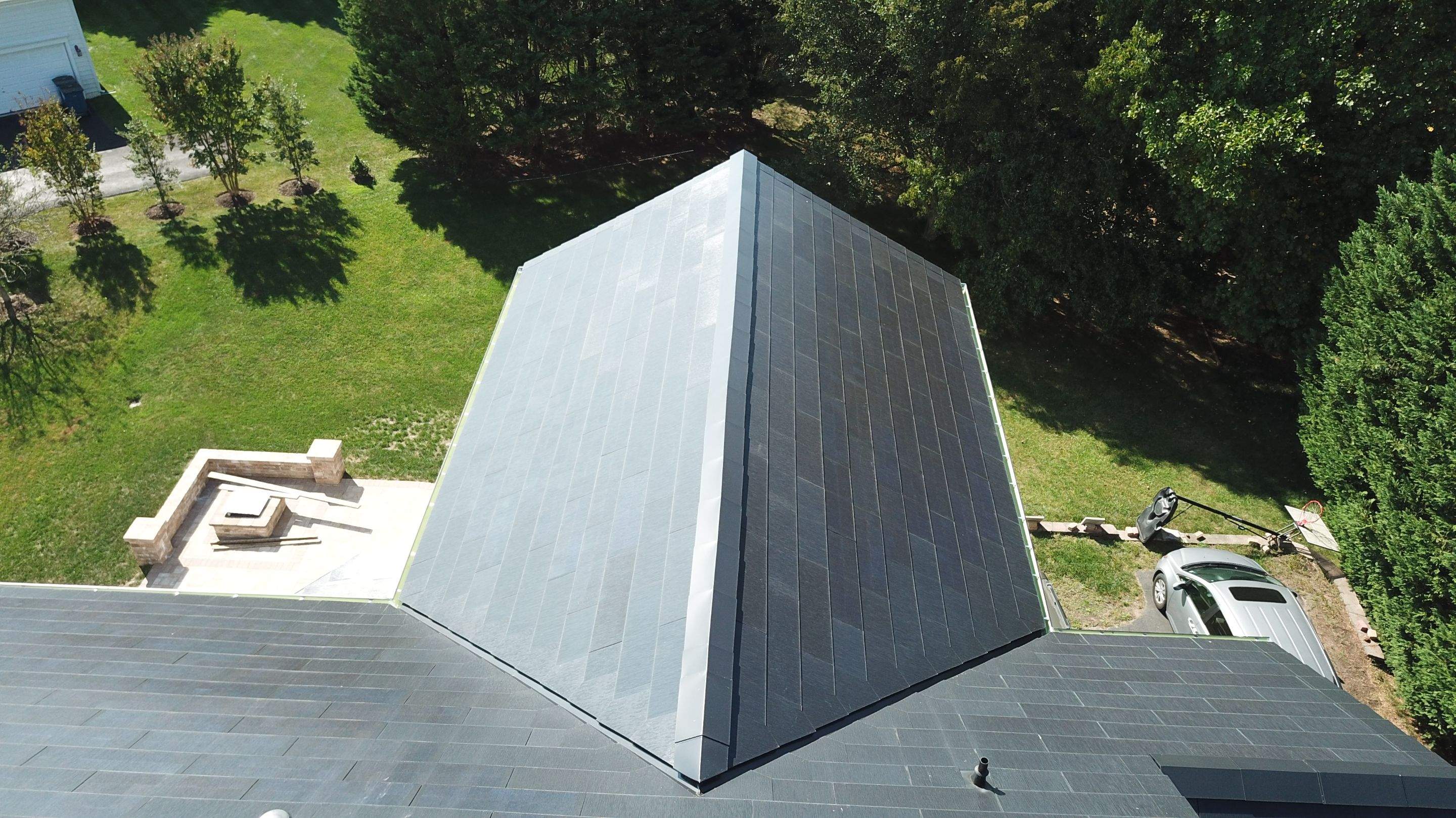 Tesla Solar Roof Replacement using Tesla Solar Roof V3 tiles by American Home Contractors