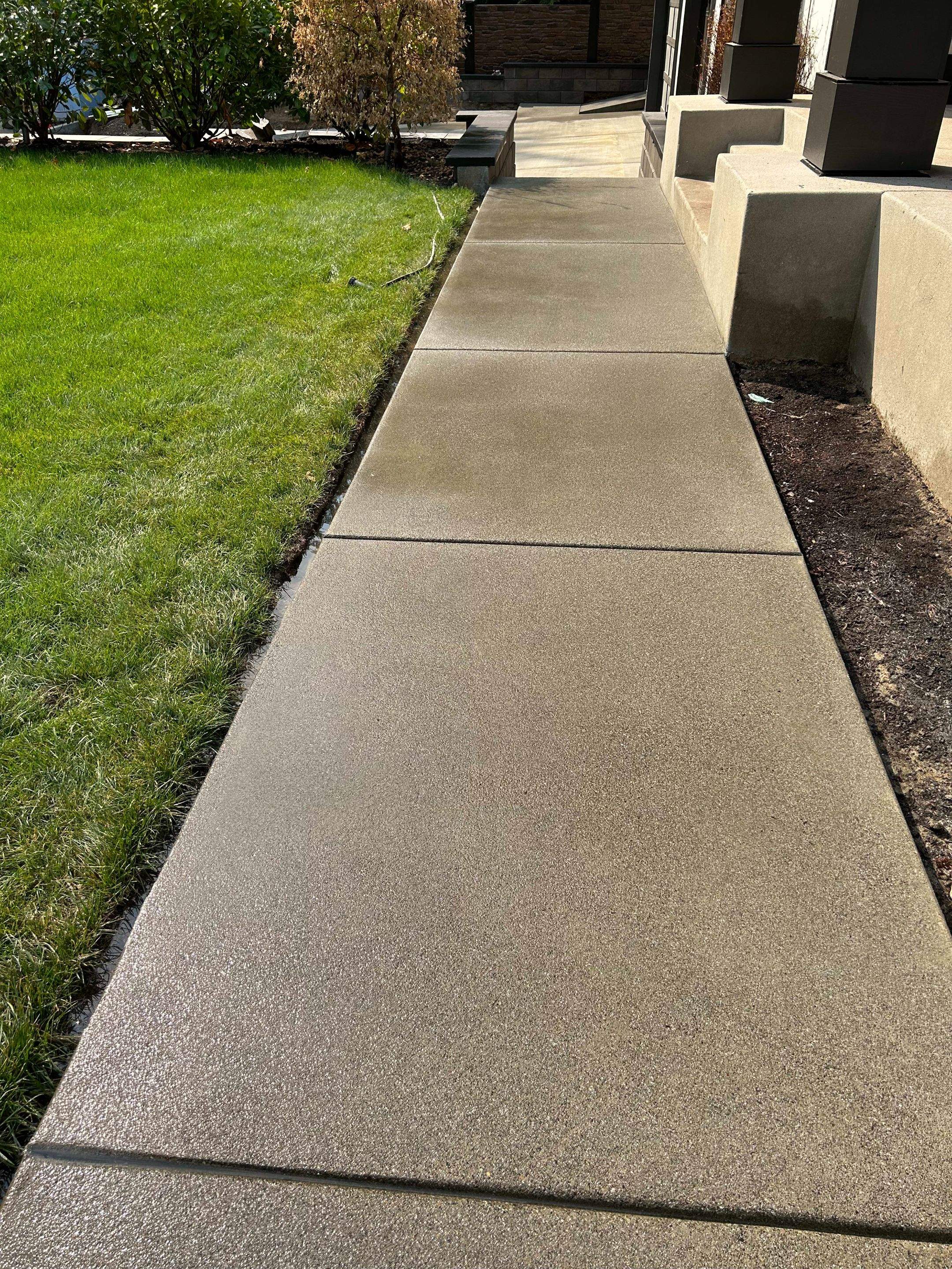 Bruce | Broom Finish Driveway, Concrete Project by Jireh Asphalt & Concrete Inc 